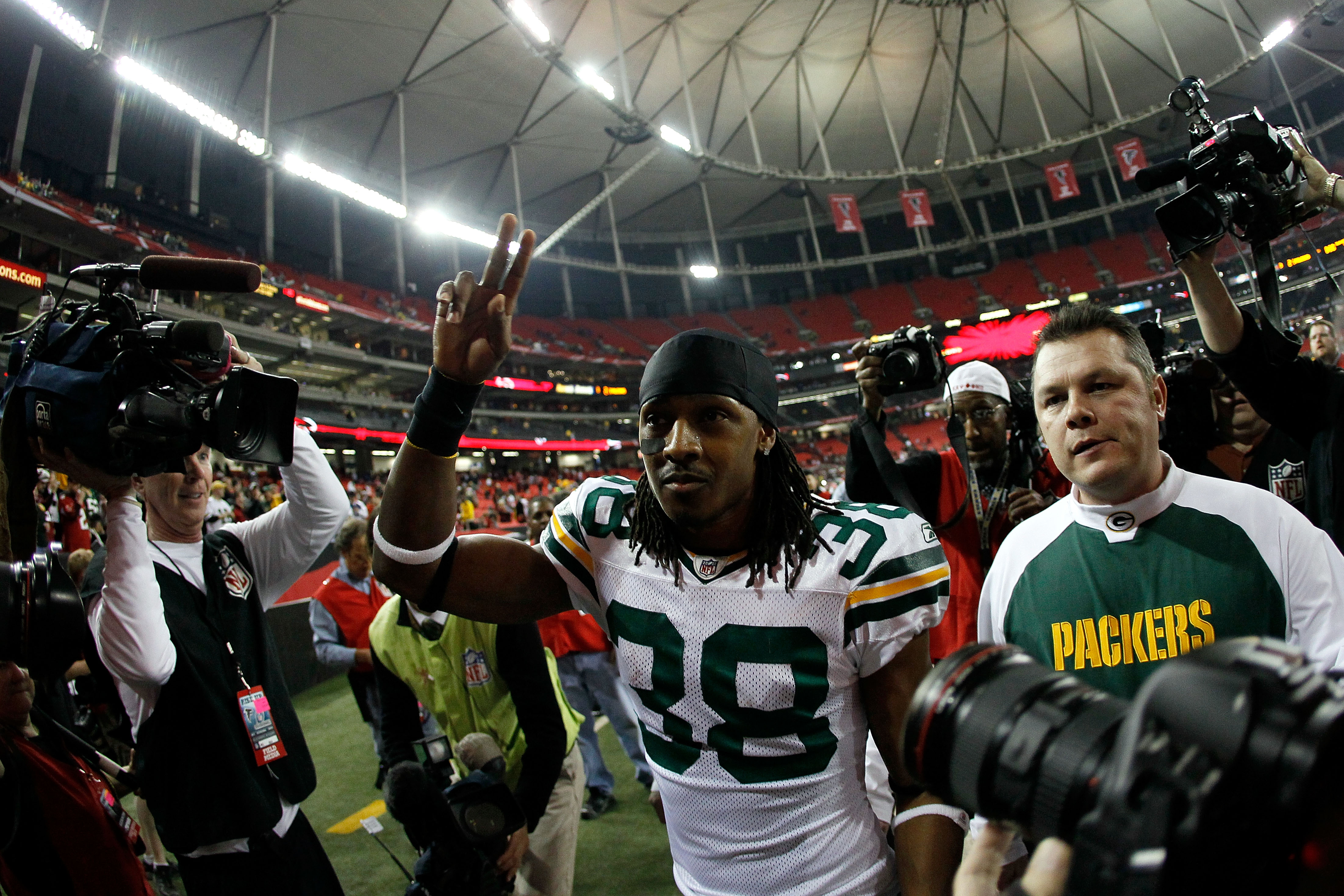 ATLANTA, GA - JANUARY 15:  Tramon Williams #38 of the Green Bay Packers walks off the field after the Packers won 48-21 against the Atlanta Falcons during their 2011 NFC divisional playoff game at Georgia Dome on January 15, 2011 in Atlanta, Georgia.  (Ph