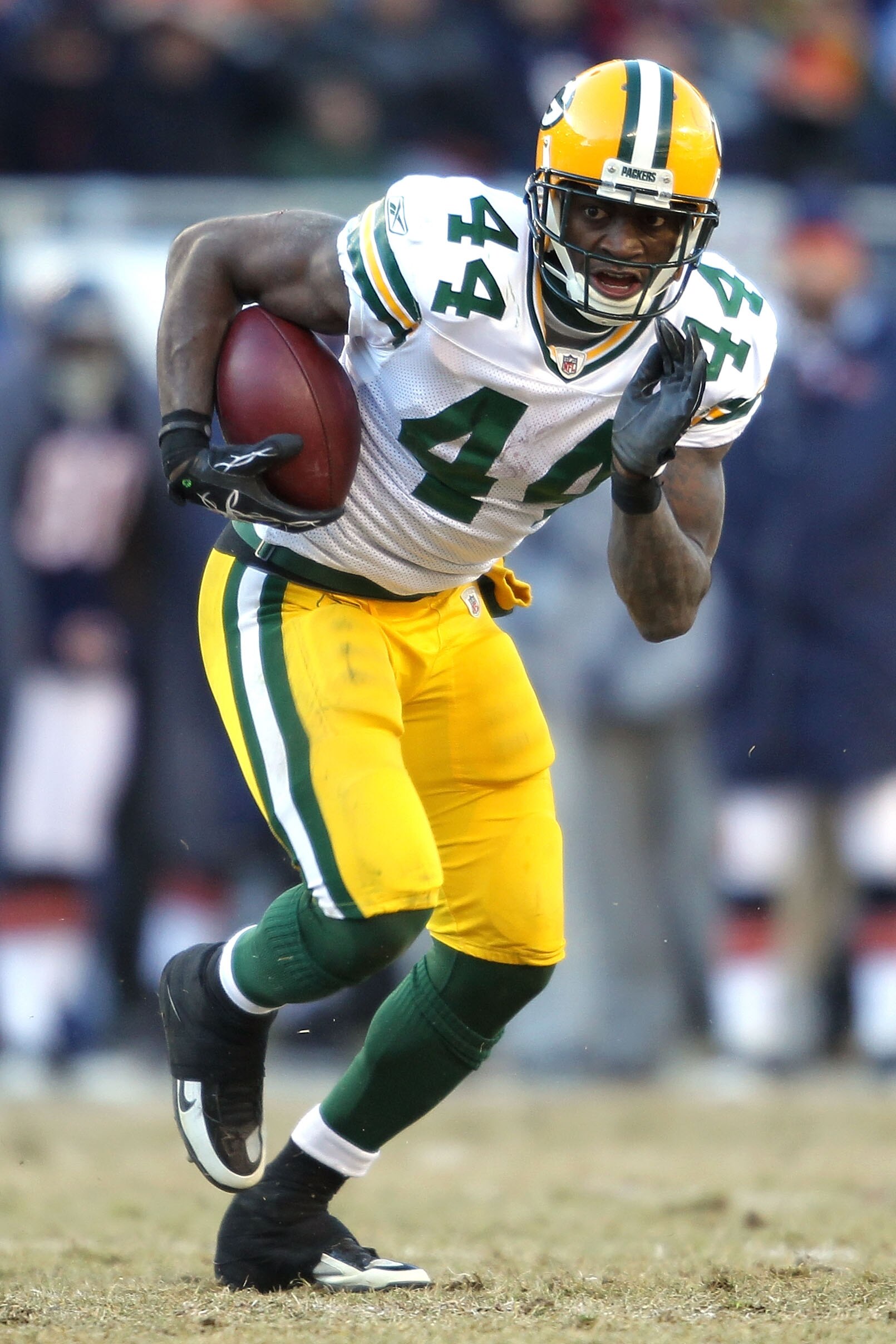 CHICAGO, IL - JANUARY 23:  Running back James Starks #44 of the Green Bay Packers runs the ball against the Chicago Bears in the NFC Championship Game at Soldier Field on January 23, 2011 in Chicago, Illinois.  (Photo by Andy Lyons/Getty Images)