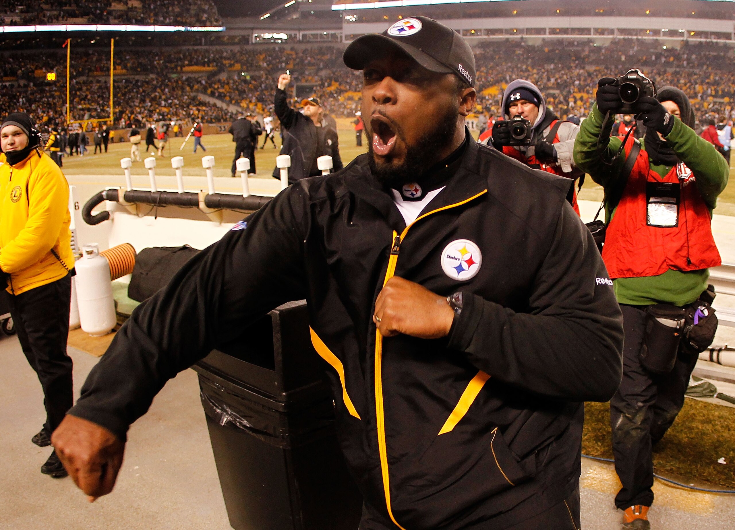 PITTSBURGH, PA - JANUARY 15: Head coach Mike Tomlin of the Pittsburgh Steelers celebrates after defeating the Baltimore Ravens 31-24 in the AFC Divisional Playoff Game at Heinz Field on January 15, 2011 in Pittsburgh, Pennsylvania. (Photo by Gregory Sha PITTSBURGH, PA - JANUARY 15: Head coach Mike Tomlin of the Pittsburgh Steelers celebrates after defeating the Baltimore Ravens 31-24 in the AFC Divisional Playoff Game at Heinz Field on January 15, 2011 in Pittsburgh, Pennsylvania. (Photo by Gregory Sha