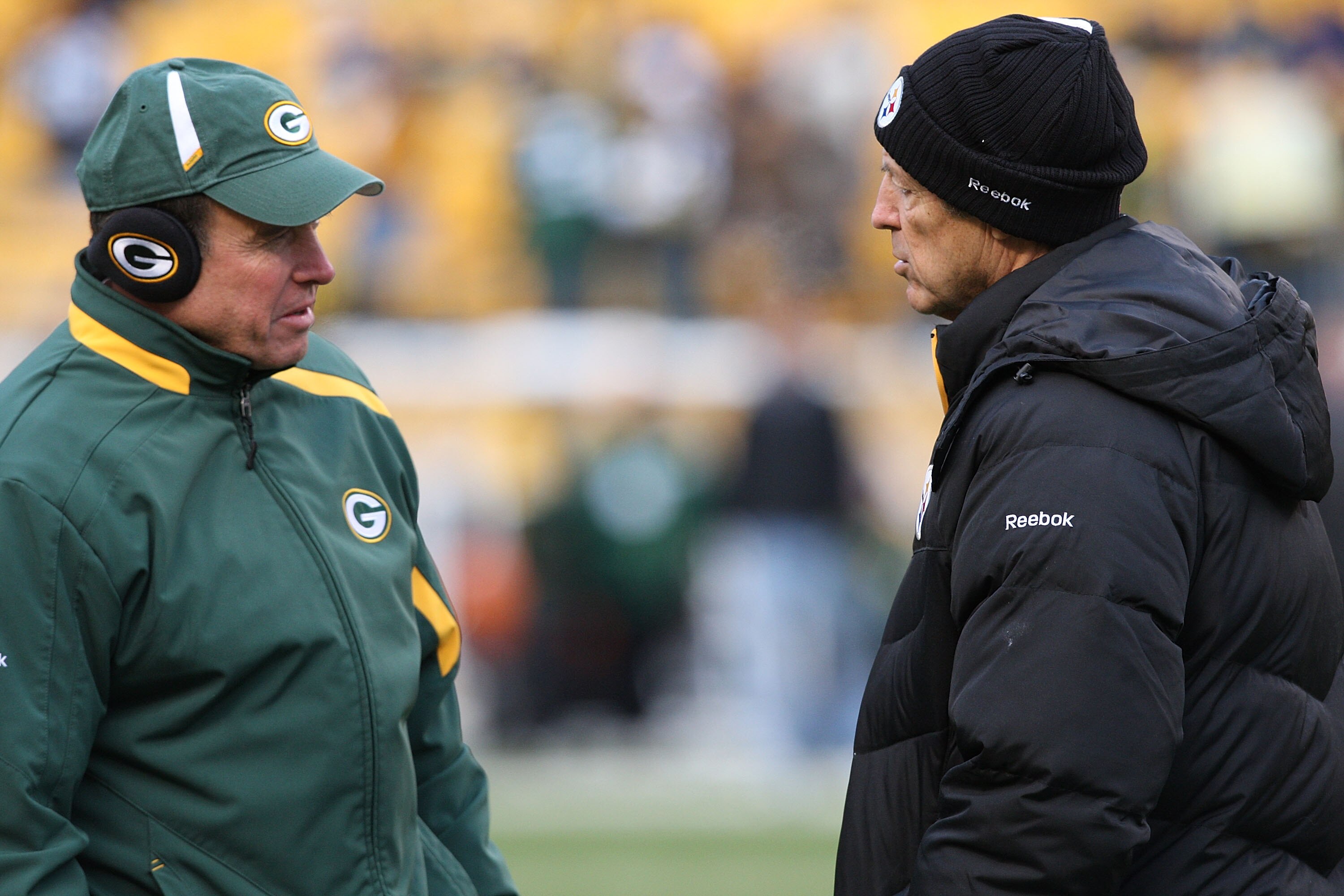 PITTSBURGH - DECEMBER 20: Defensive coordinator Dom Capers of the Green Bay Packers talks with Pittsburgh Steelers defensive coordinator Dick LeBeau prior to the game on December 20, 2009 at Heinz Field in Pittsburgh, Pennsylvania. (Photo by Karl Walter/G