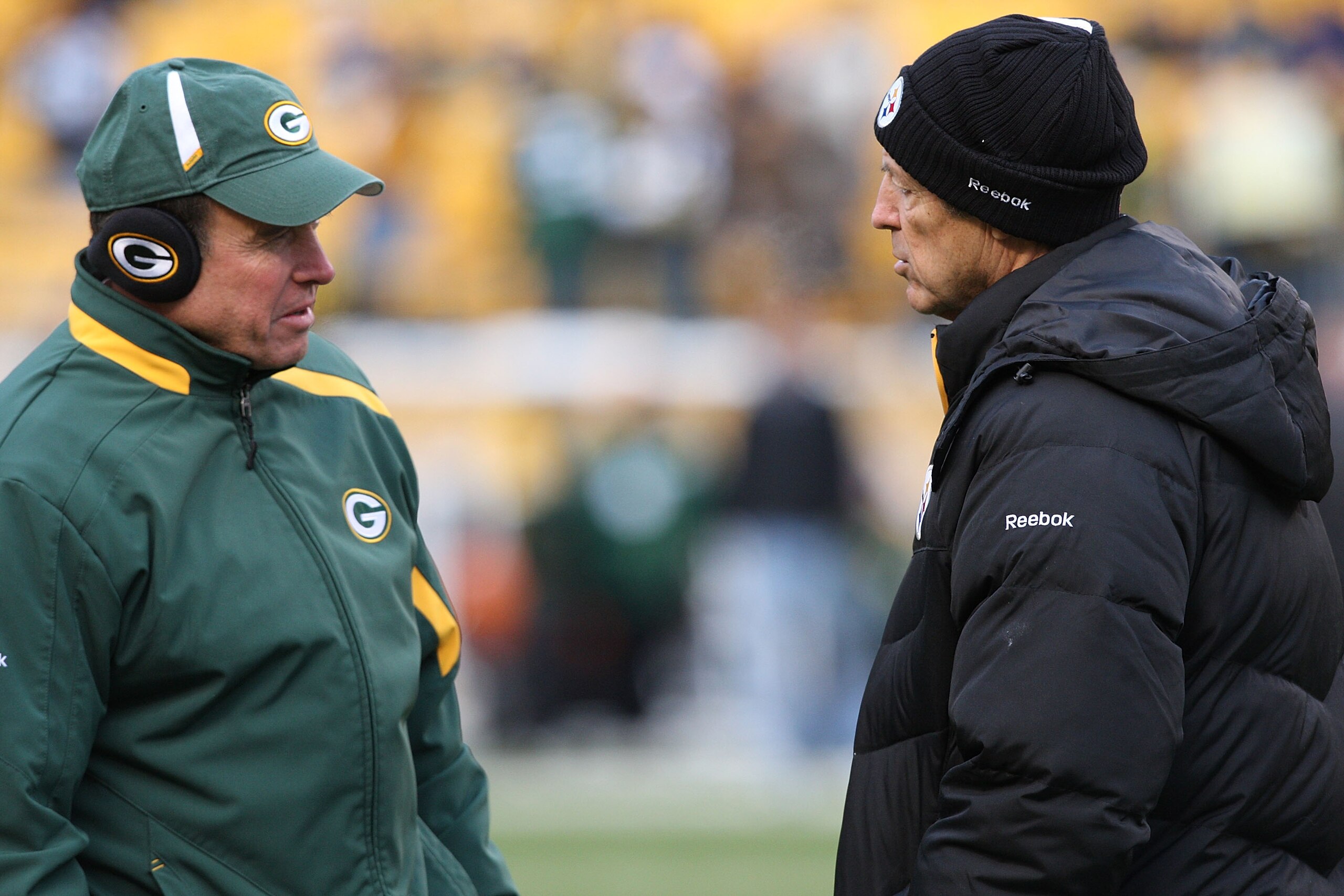 PITTSBURGH - DECEMBER 20: Defensive coordinator Dom Capers of the Green Bay Packers talks with Pittsburgh Steelers defensive coordinator Dick LeBeau prior to the game on December 20, 2009 at Heinz Field in Pittsburgh, Pennsylvania. (Photo by Karl Walter/G PITTSBURGH - DECEMBER 20: Defensive coordinator Dom Capers of the Green Bay Packers talks with Pittsburgh Steelers defensive coordinator Dick LeBeau prior to the game on December 20, 2009 at Heinz Field in Pittsburgh, Pennsylvania. (Photo by Karl Walter/G
