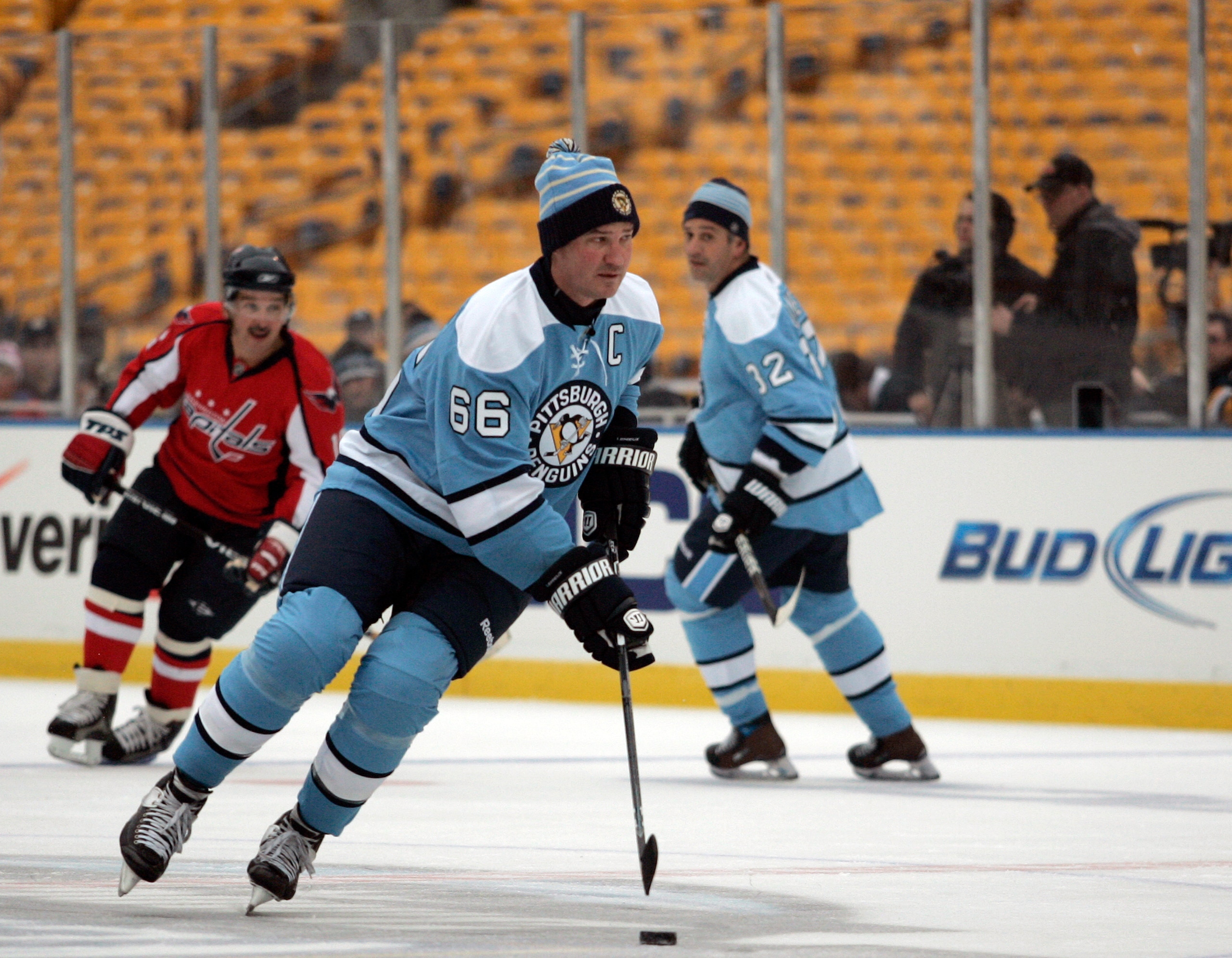 PITTSBURGH, PA - DECEMBER 31:  Mario Lemieux #66 of the Pittsburgh Penguins skates against the Washington Capitals during the 2011 NHL Winter Classic Alumni Game on December 31, 2010 at Heinz Field in Pittsburgh, Pennsylvania.  (Photo by Justin K. Aller/G