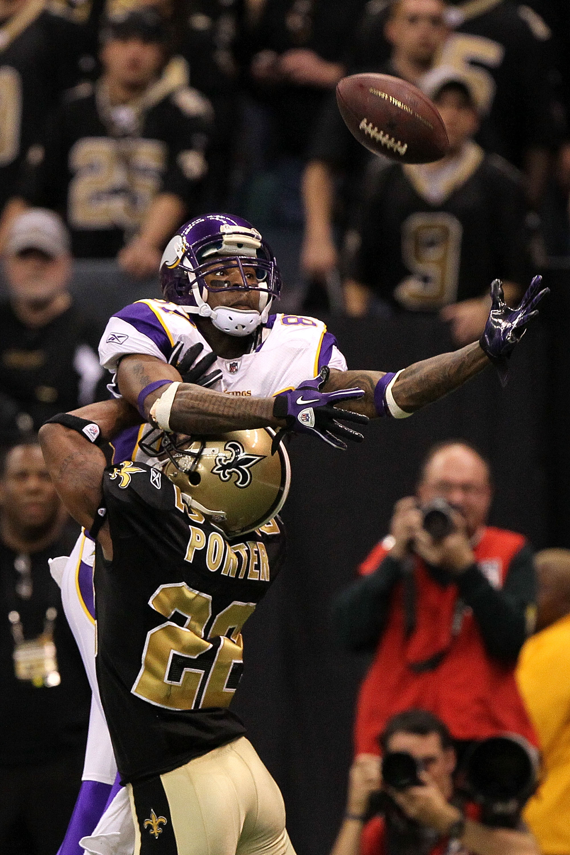 NEW ORLEANS - JANUARY 24:  Tracy Porter #22 of the New Orleans Saints commits pass interference in the end zone against Bernard Berrian #87 of the Minnesota Vikings during the NFC Championship Game at the Louisiana Superdome on January 24, 2010 in New Orl