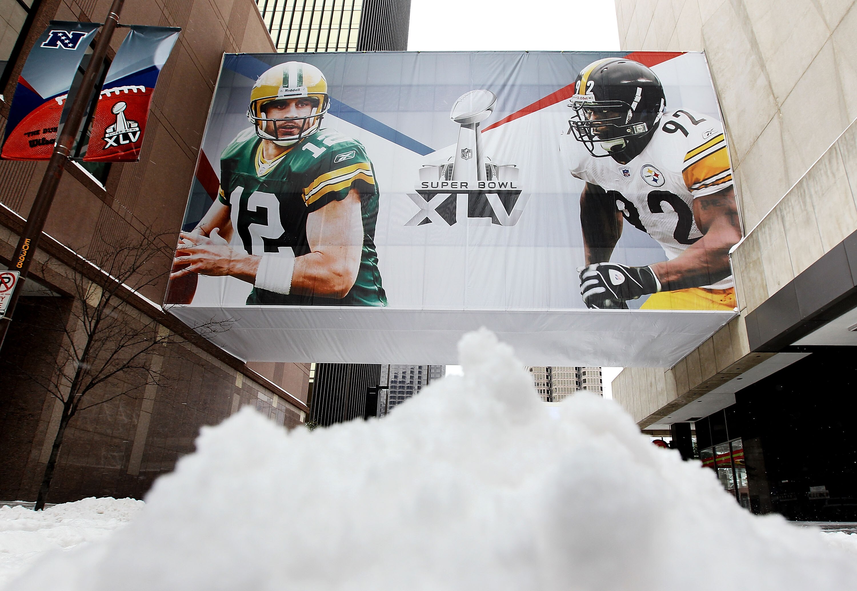 DALLAS - FEBRUARY 04:  Snow is piled up on the street after a snow storm hit the Dallas area February 4, 2011 in Dallas, Texas. More than four inches of snow fell overnight in the North Texas area. The Green Bay Packers will play the Pittsburgh Steelers i