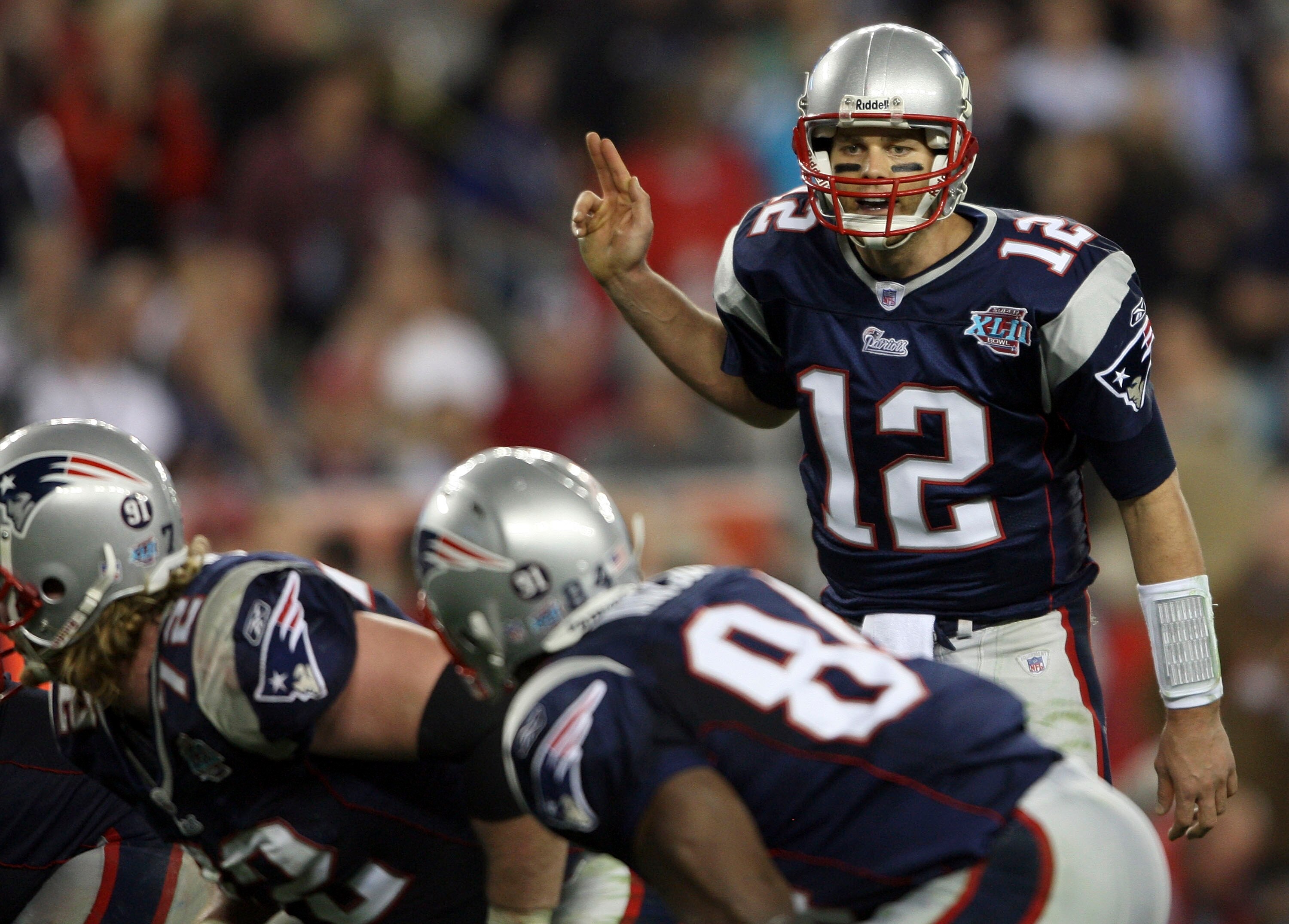 GLENDALE, AZ - FEBRUARY 03:  Tom Brady #12 of of the New England Patriots calls out from under center in the fourth quarter of Super Bowl XLII against the New York Giants on February 3, 2008 at the University of Phoenix Stadium in Glendale, Arizona.  (Pho