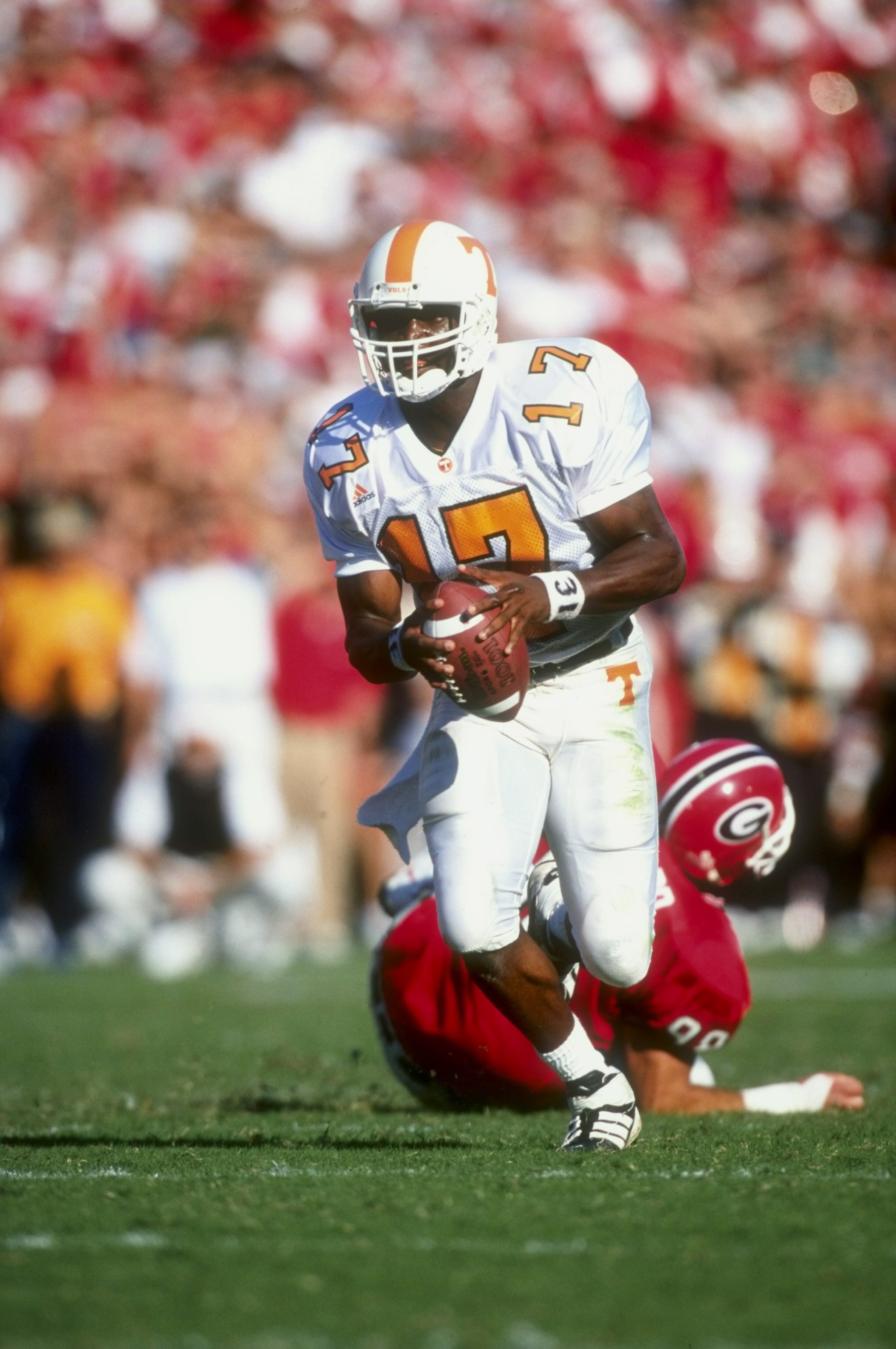 10 Oct 1998:  Quarterback Tee Martin #17 of the Tennessee Volunteers in action during the game against the Georgia Bulldogs at the Sanford Stadium in Athens, Geogia. The Volunteers defeated the Bulldogs 22-3. Mandatory Credit: Vincent Laforet  /Allsport