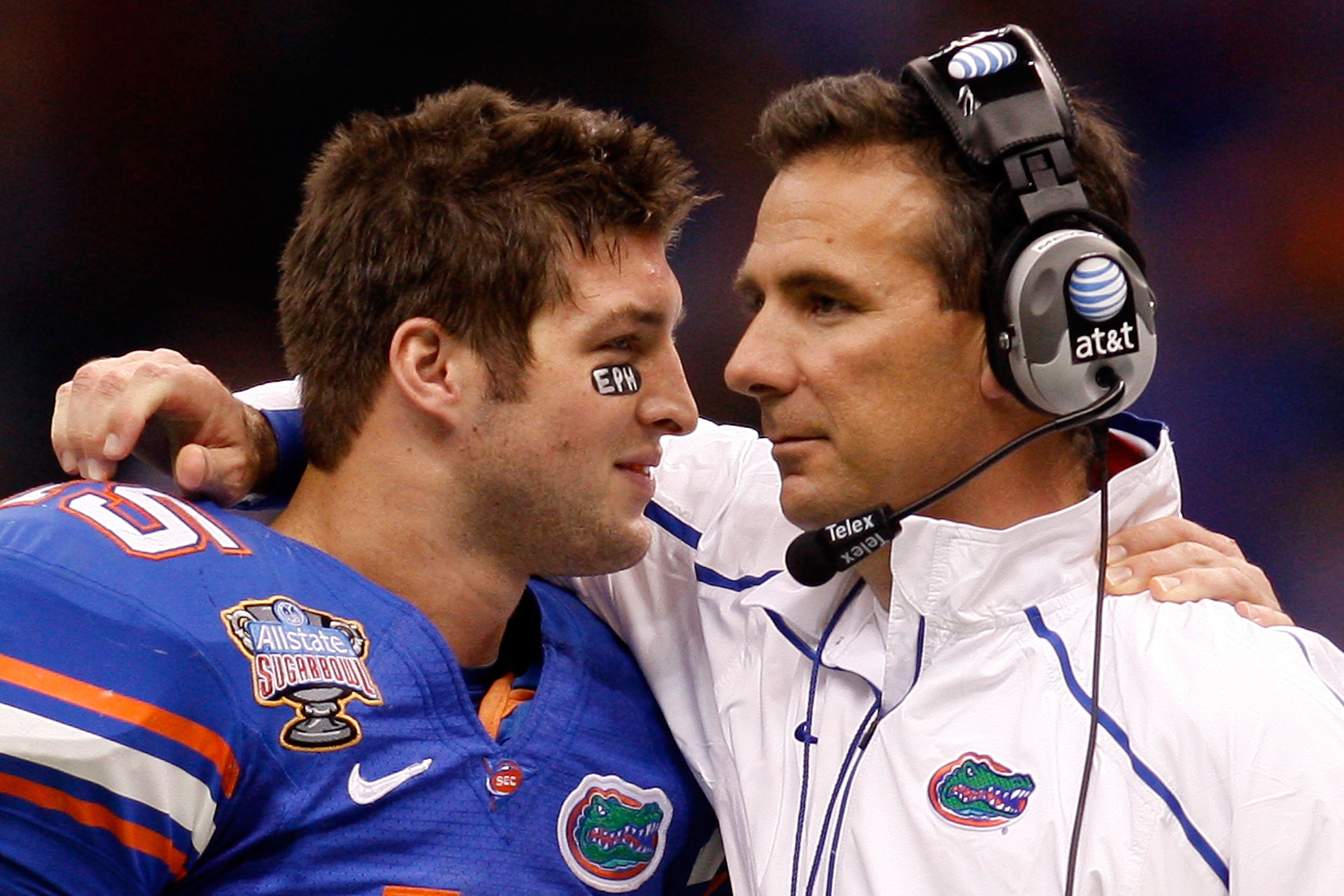 NEW ORLEANS - JANUARY 01:  Tim Tebow #15 of the Florida Gators hugs his head coach Urban Meyer after scoring a touchdown against the Cincinnati Bearcats during the Allstate Sugar Bowl at the Louisana Superdome on January 1, 2010 in New Orleans, Louisiana.