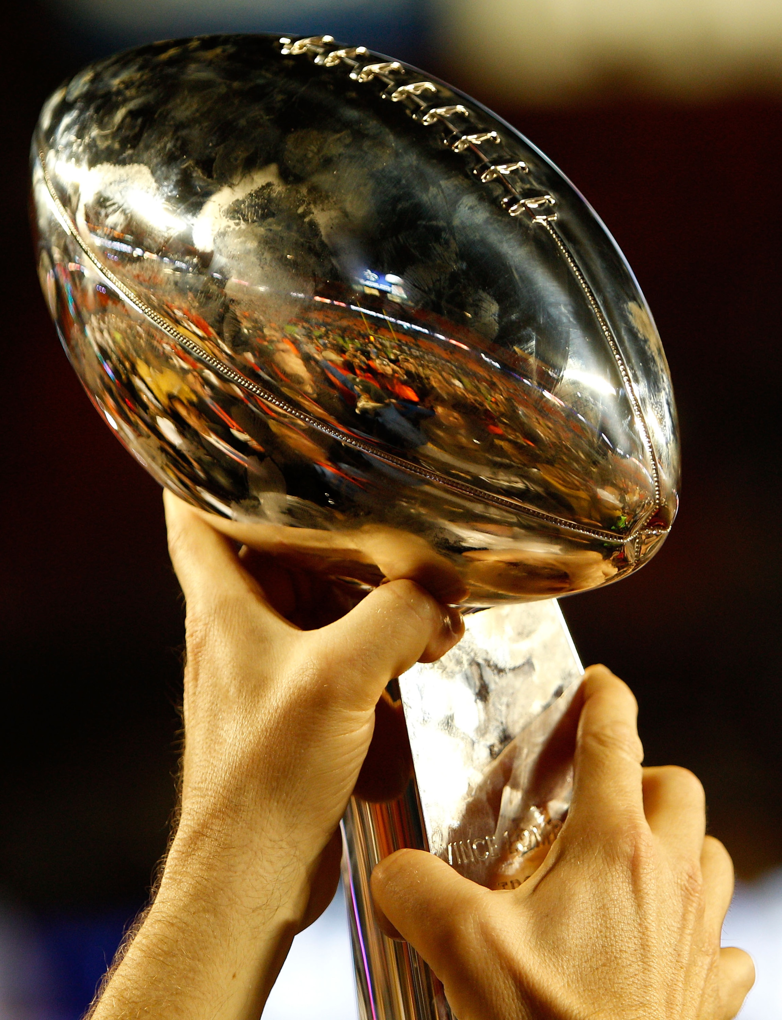 MIAMI GARDENS, FL - FEBRUARY 07:  A detail of the Vince Lombardi Trophy as the New Orleans Saints celebrate after defeating the Indianapolis Colts during Super Bowl XLIV on February 7, 2010 at Sun Life Stadium in Miami Gardens, Florida.  (Photo by Chris G