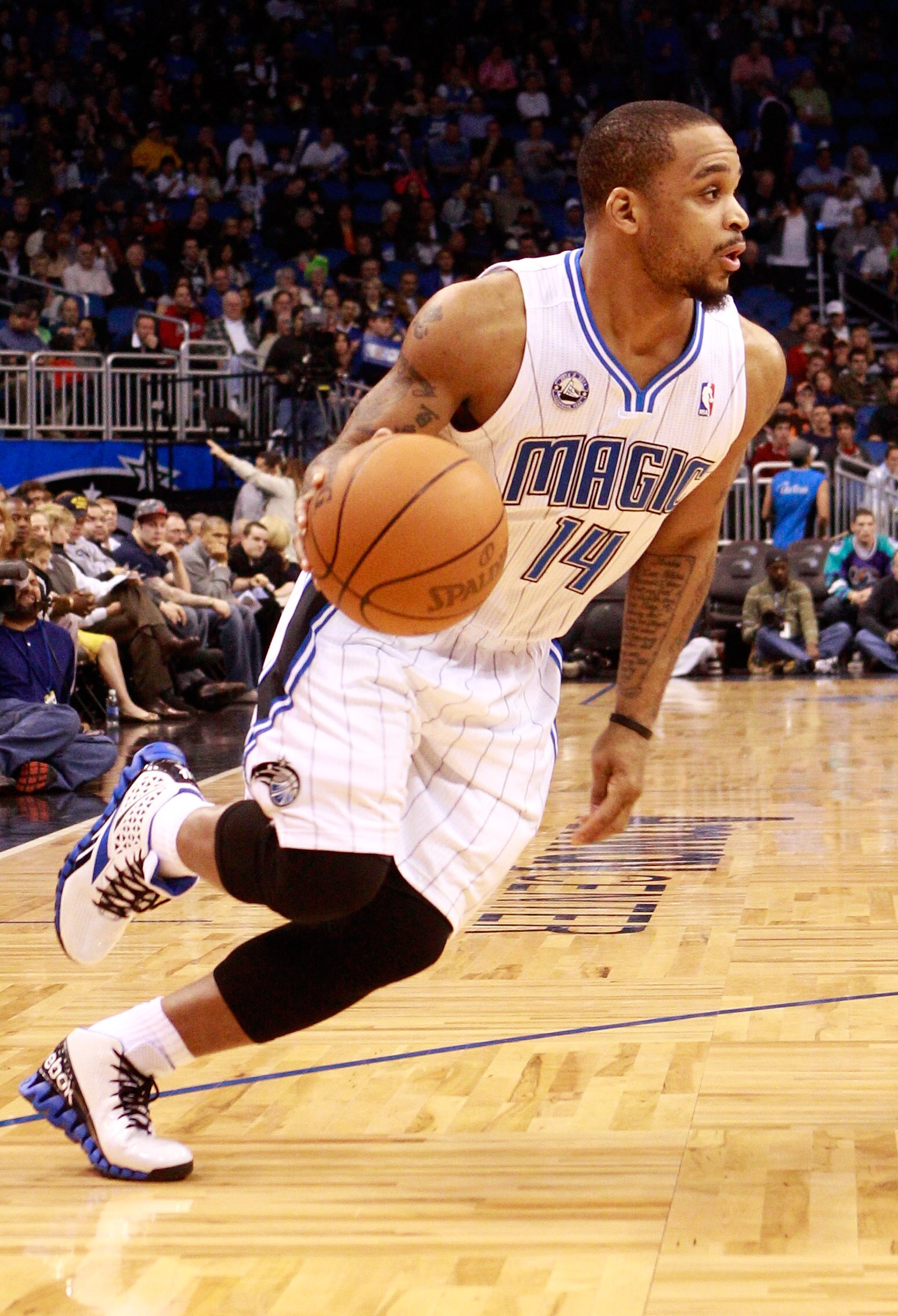 ORLANDO, FL - JANUARY 24:  Jameer Nelson #14 of the Orlando Magic drives to the basket during the game against the Detroit Pistons at Amway Arena on January 24, 2011 in Orlando, Florida.  NOTE TO USER: User expressly acknowledges and agrees that, by downl