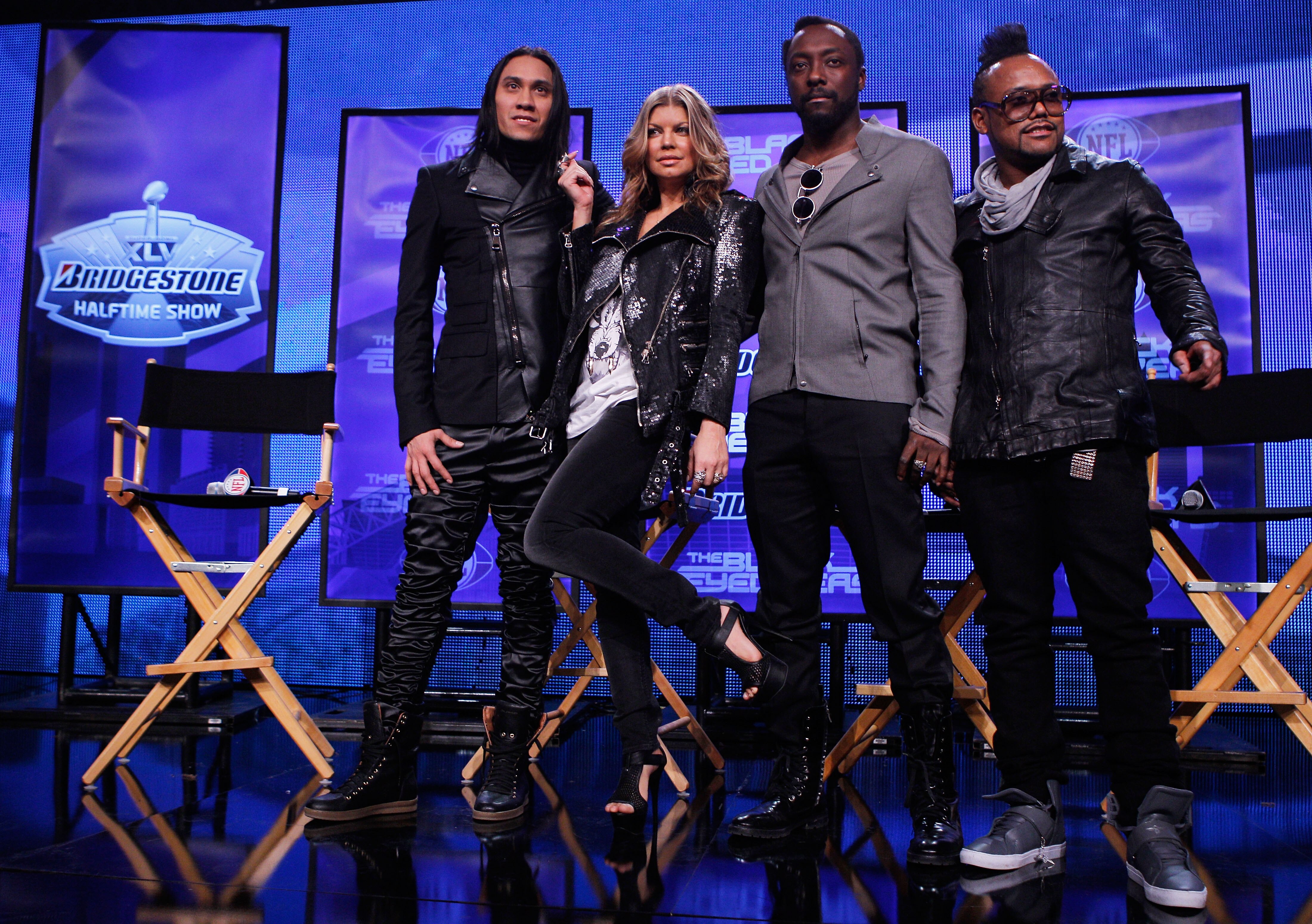 DALLAS, TX - FEBRUARY 03:  (L-R) Taboo, Fergie, will.i.am and apl.de.ap of the Black Eyed Peas attend a press conference at the Super Bowl XLV media center on February 3, 2011 in Dallas, Texas. The Black Eyed Peas will perform during the Bridgestone Super