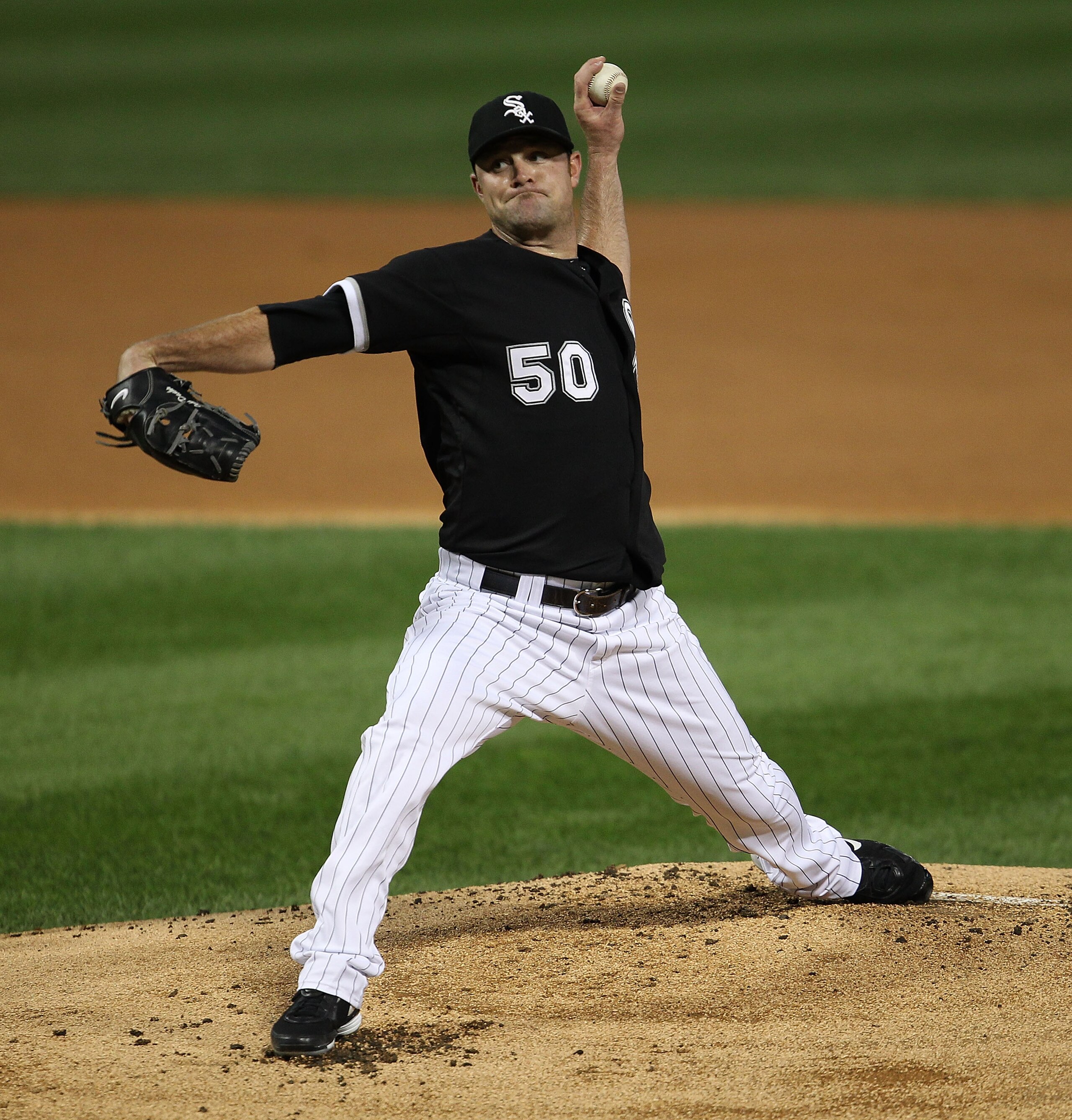 CHICAGO - SEPTEMBER 14: Starting pitcher John Danks #50 of the Chicago White Sox delivers the ball against of the Minnesota Twins at U.S. Cellular Field on September 14, 2010 in Chicago, Illinois. (Photo by Jonathan Daniel/Getty Images)