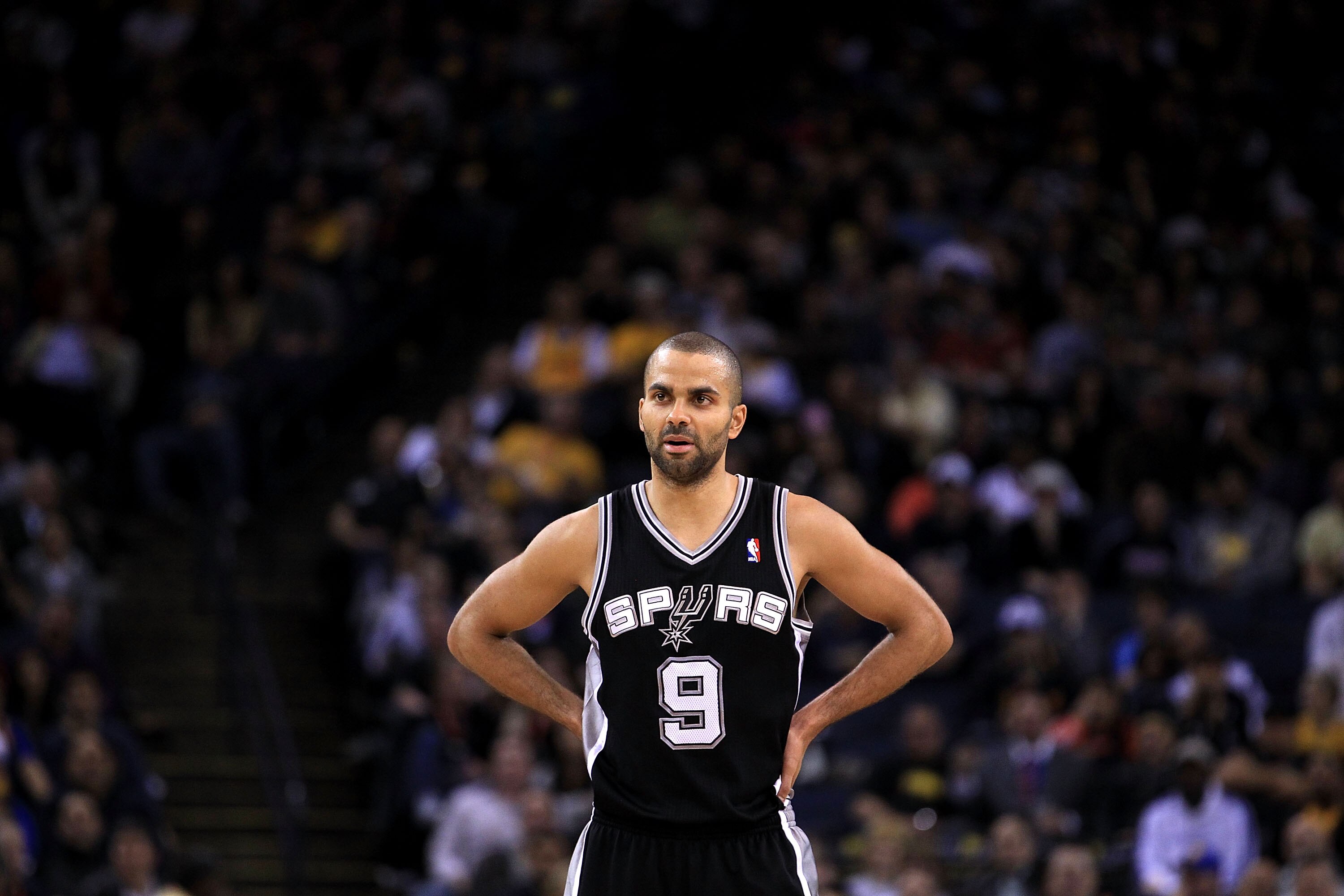 OAKLAND, CA - JANUARY 24:  Tony Parker #9 of the San Antonio Spurs in action against the Golden State Warriors at Oracle Arena on January 24, 2011 in Oakland, California.  NOTE TO USER: User expressly acknowledges and agrees that, by downloading and or us