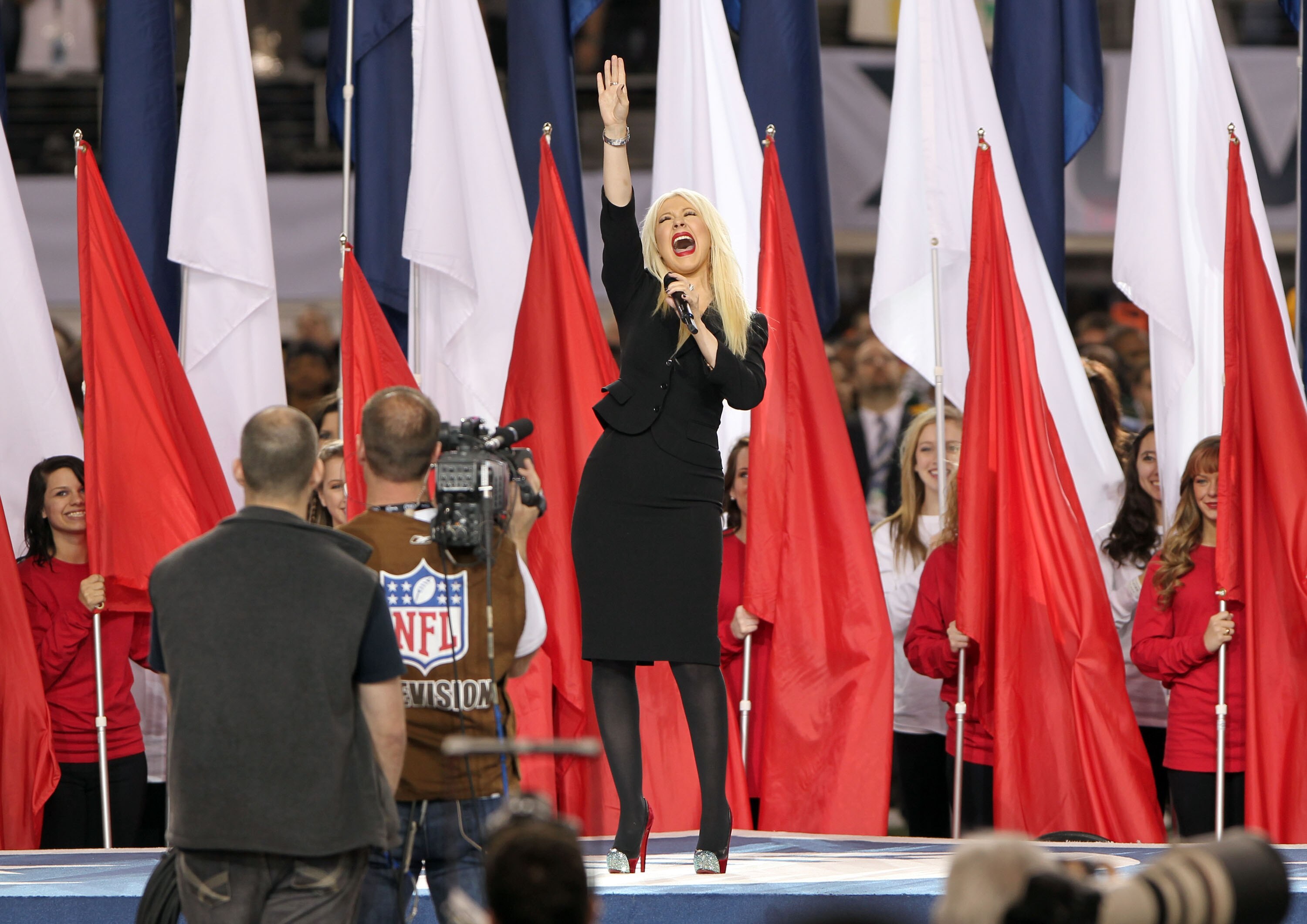 ARLINGTON, TX - FEBRUARY 06:  Singer Christina Aguilera performs during the Bridgestone Super Bowl XLV Pregame Show at Dallas Cowboys Stadium on February 6, 2011 in Arlington, Texas.  (Photo by Christopher Polk/Getty Images)