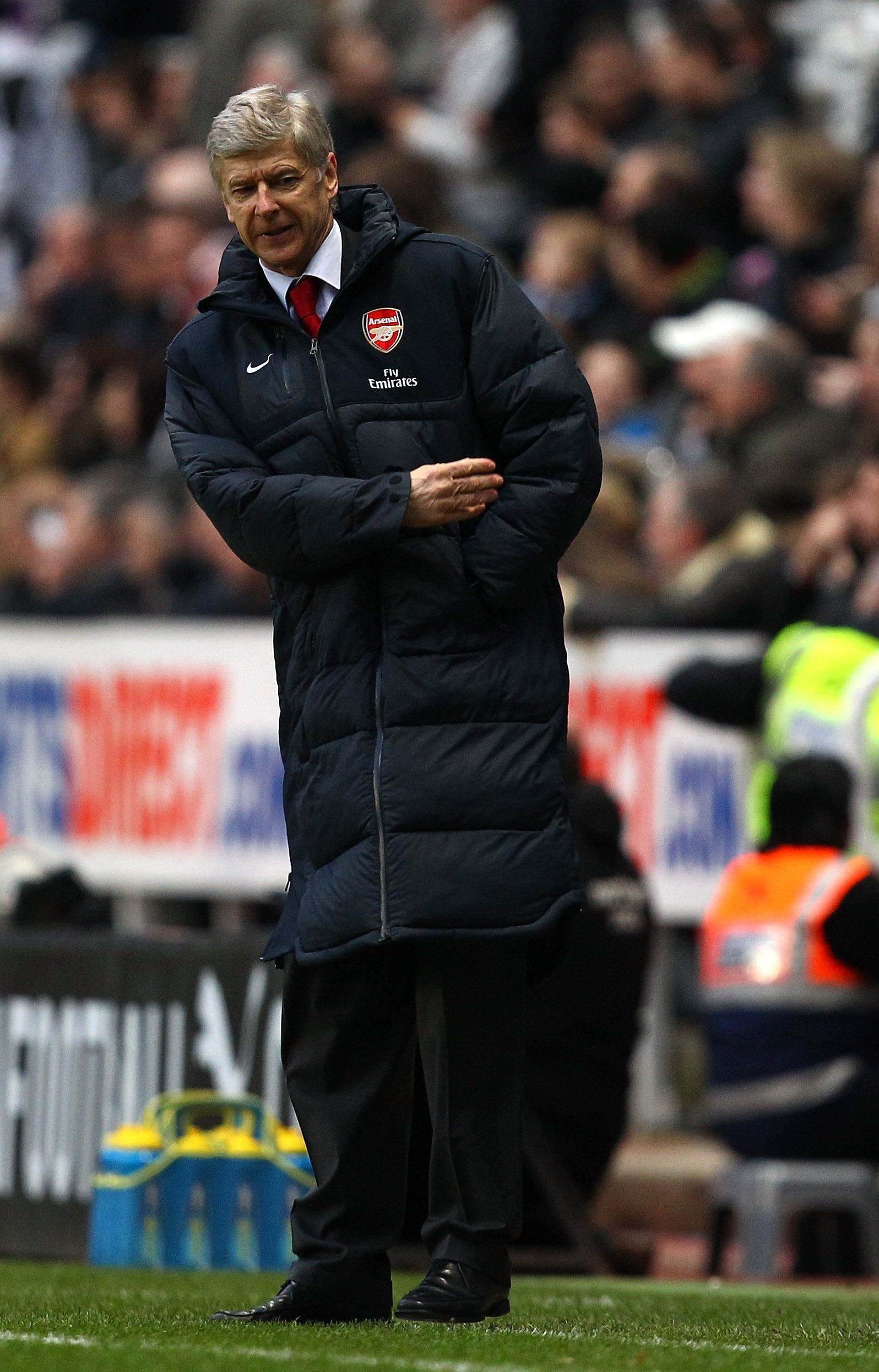 NEWCASTLE UPON TYNE, ENGLAND - FEBRUARY 05:  Arsenal manager Arsene Wenger gestures after Newcastle are awarded a penalty during the Barclays Premier League match between Newcastle United and Arsenal at St James' Park on February 5, 2011 in Newcastle upon