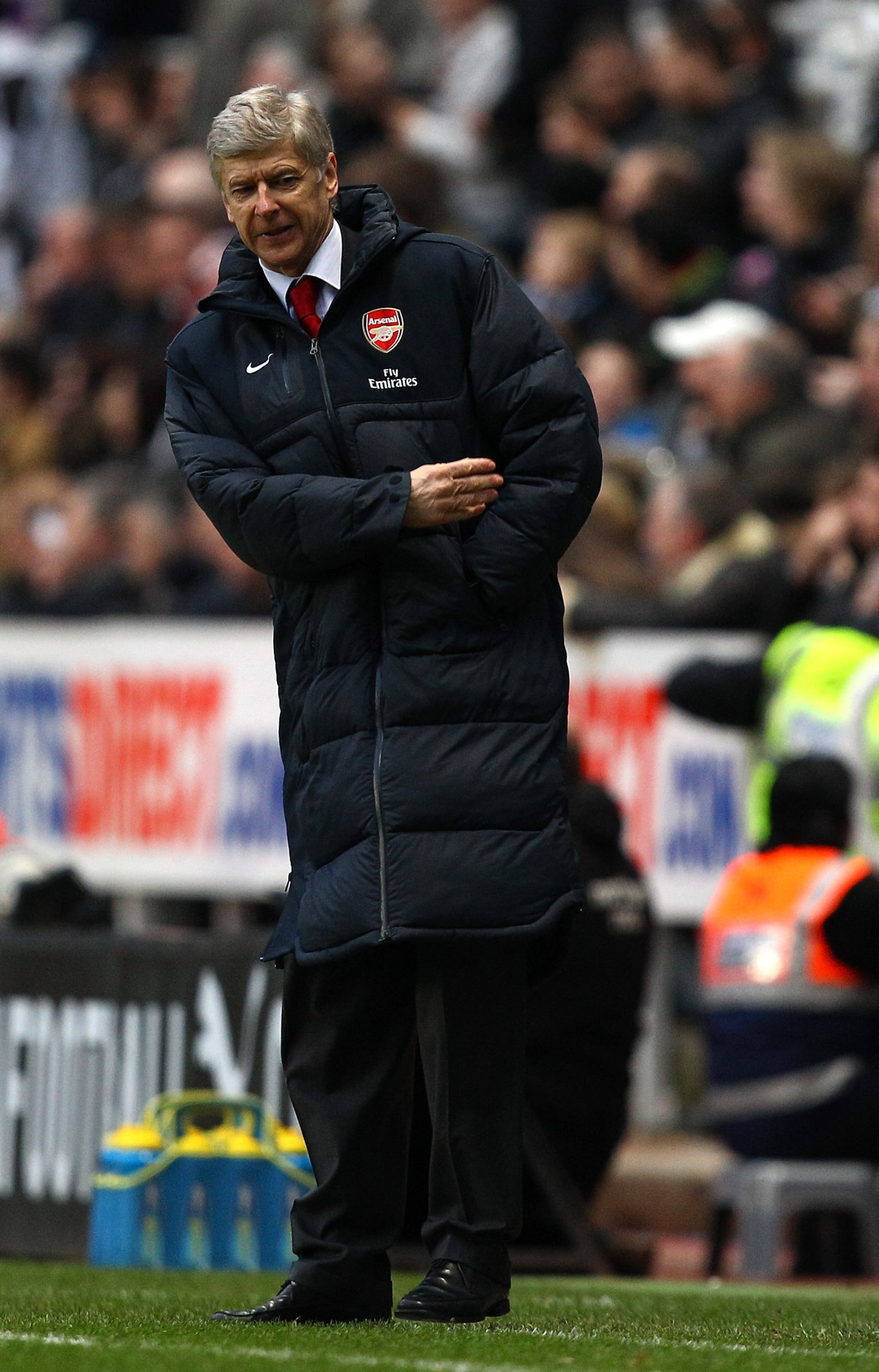 NEWCASTLE UPON TYNE, ENGLAND - FEBRUARY 05:  Arsenal manager Arsene Wenger gestures after Newcastle are awarded a penalty during the Barclays Premier League match between Newcastle United and Arsenal at St James' Park on February 5, 2011 in Newcastle upon