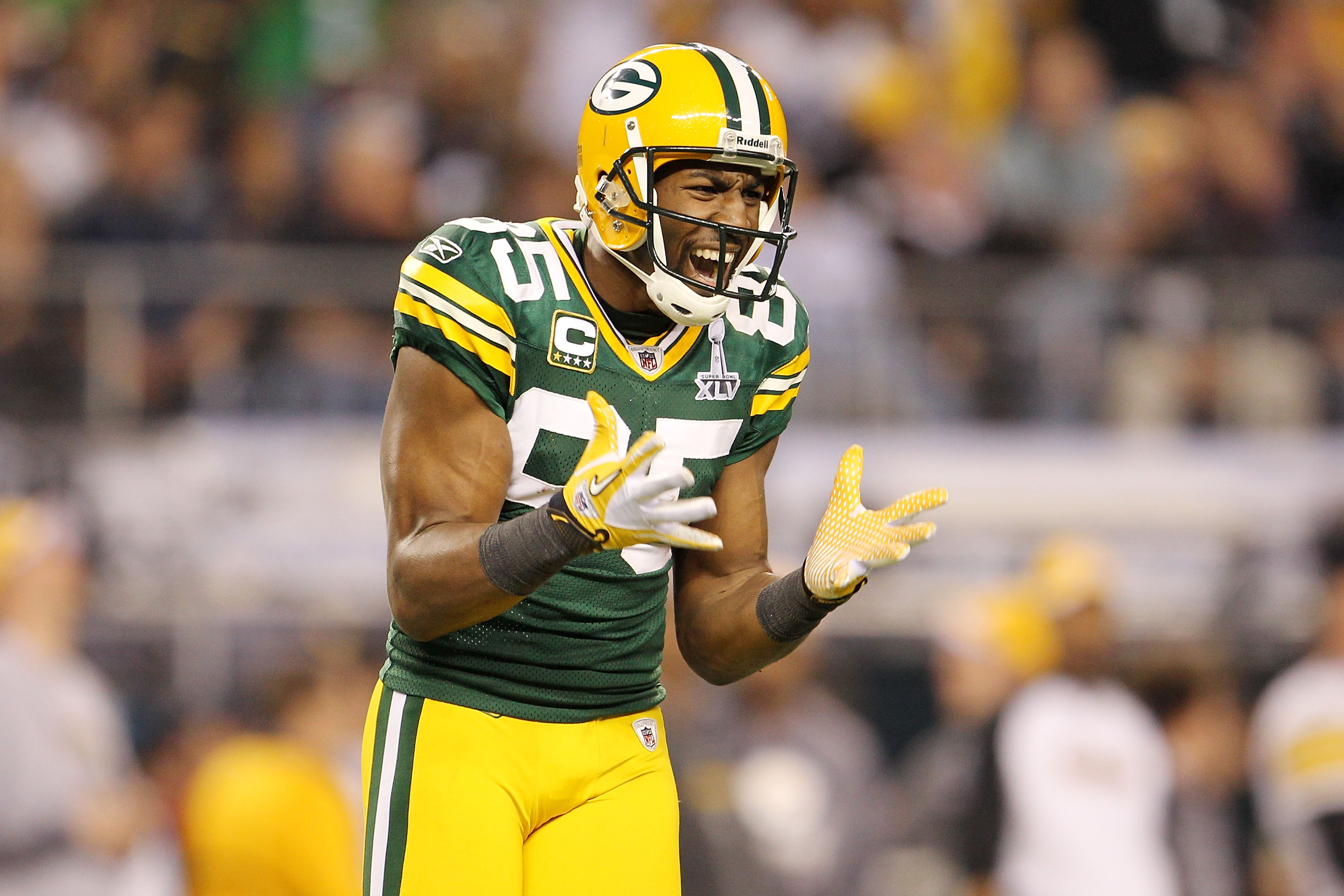 ARLINGTON, TX - FEBRUARY 06:  Greg Jennings #85 of the Green Bay Packers celebrates after a first down catch in the fourth quarter during Super Bowl XLV at Cowboys Stadium on February 6, 2011 in Arlington, Texas.  (Photo by Jamie Squire/Getty Images)