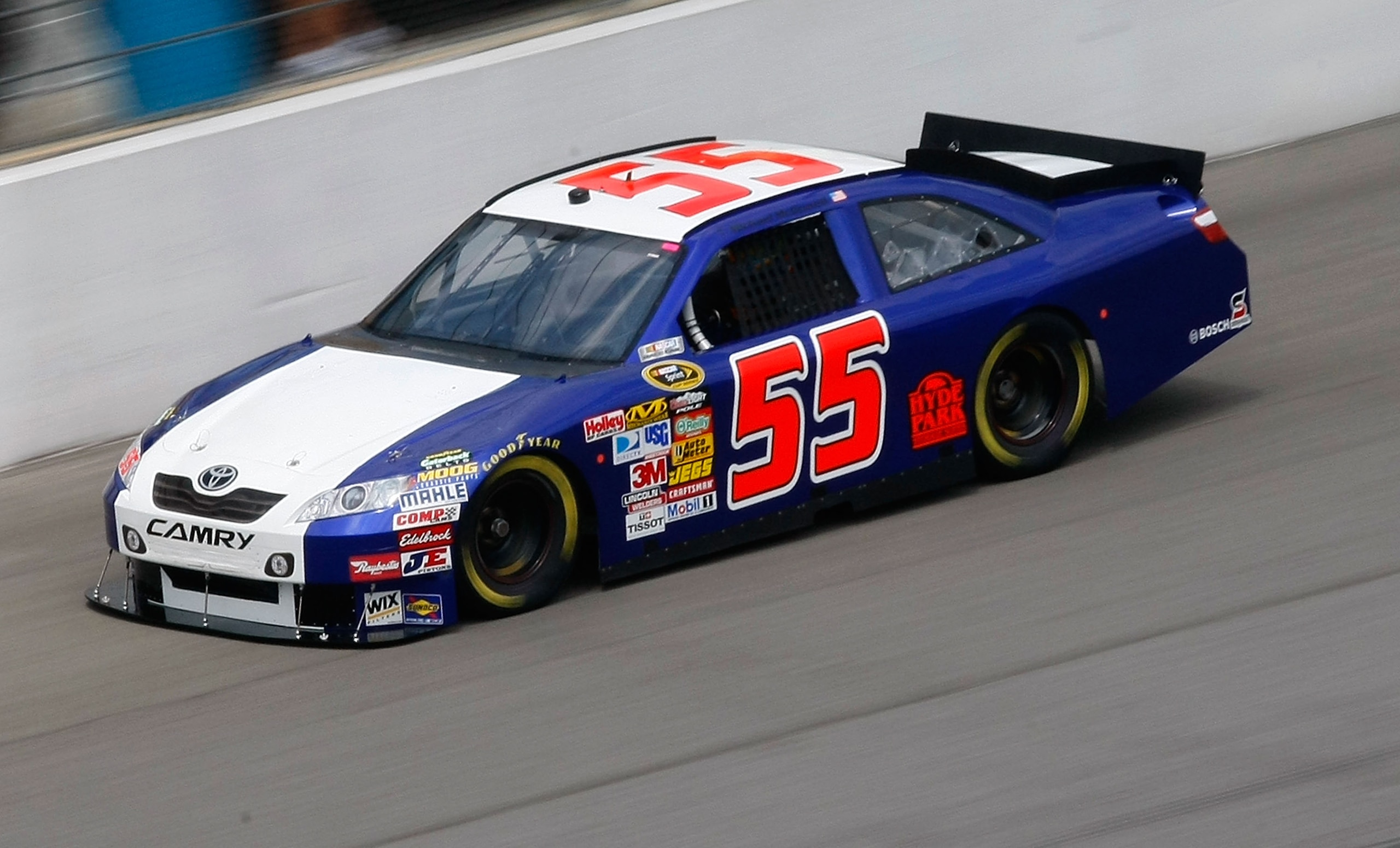 BROOKLYN, MI - AUGUST 13:  Michael McDowell, driver of the #55 PRISM Motorsports Toyota, drives on track uring practice for the NASCAR Sprint Cup Series CARFAX 400 at Michigan International Speedway on August 13, 2010 in Brooklyn, Michigan.  (Photo by Geo