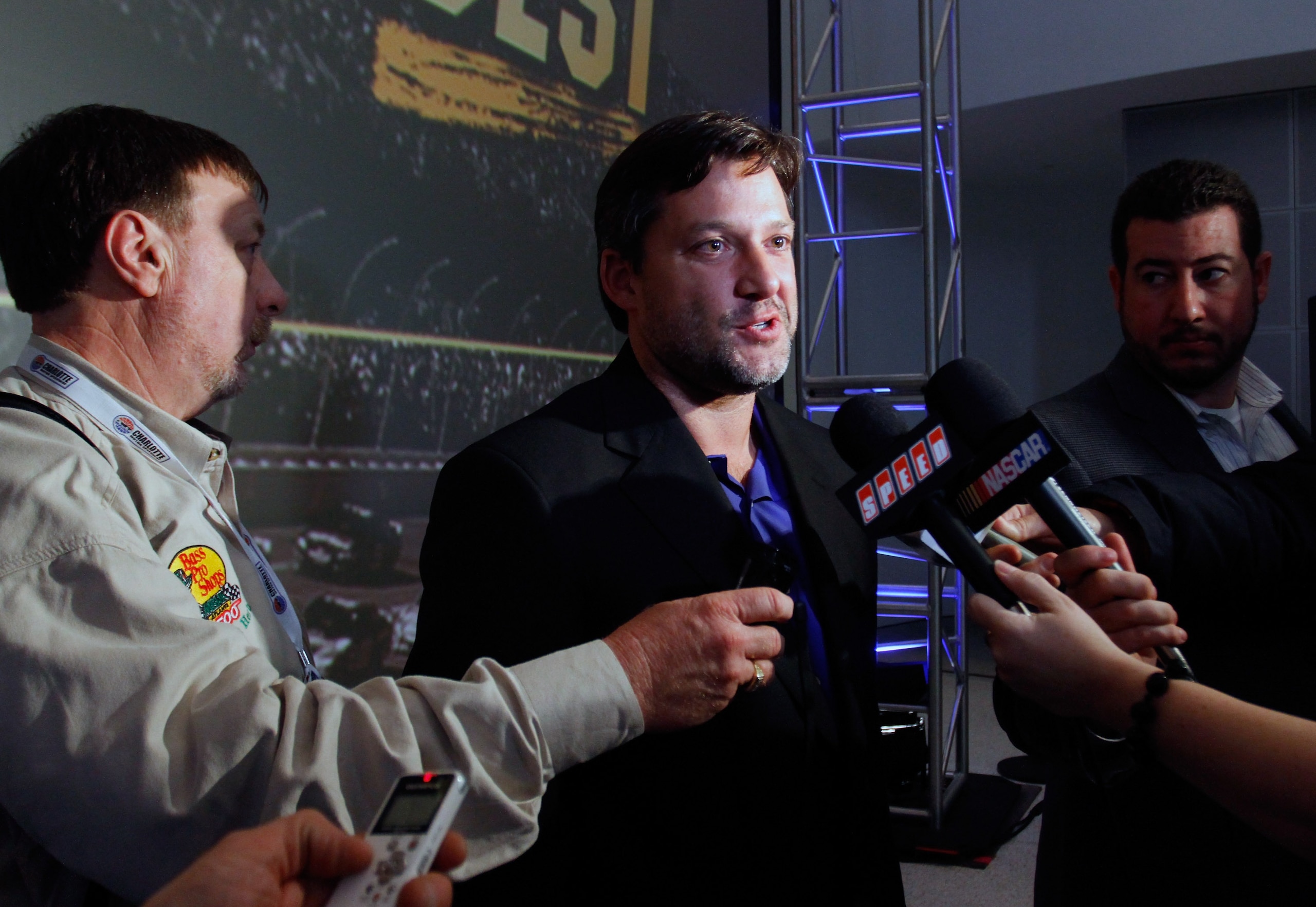 CHARLOTTE, NC - JANUARY 26:  Tony Stewart, driver of the #14 Office Depot Chevrolet, speaks with the media during the NASCAR Sprint Media Tour hosted by Charlotte Motor Speedway, held at the NASCAR Hall of Fame on January 26, 2011 in Charlotte, North Caro