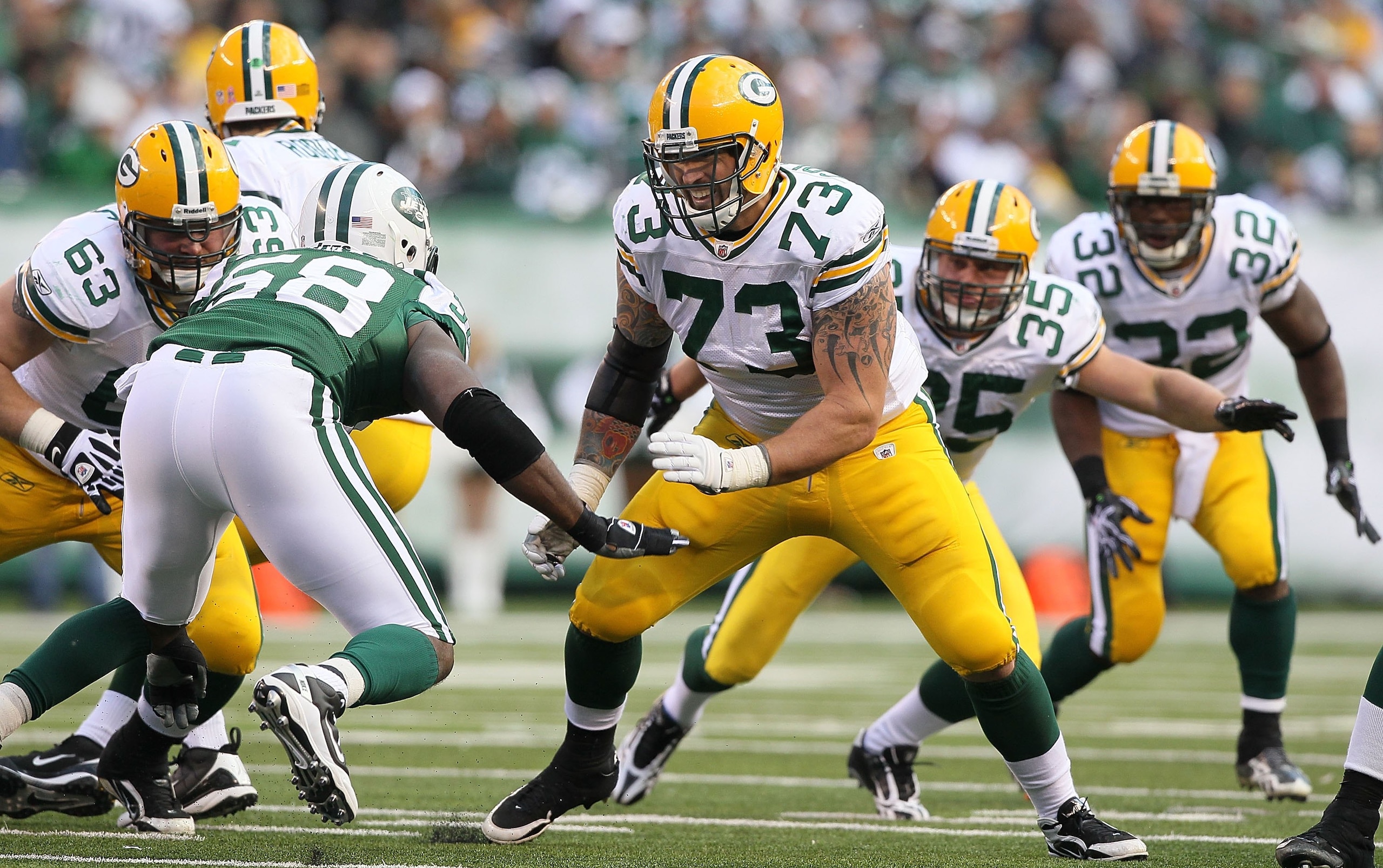 EAST RUTHERFORD, NJ - OCTOBER 31:  Daryn Colledge #73 of the Green Bay Packers in action against the New York Jets on October 31, 2010 at the New Meadowlands Stadium in East Rutherford, New Jersey.The Packers defeated the Jets 9-0.  (Photo by Jim McIsaac/
