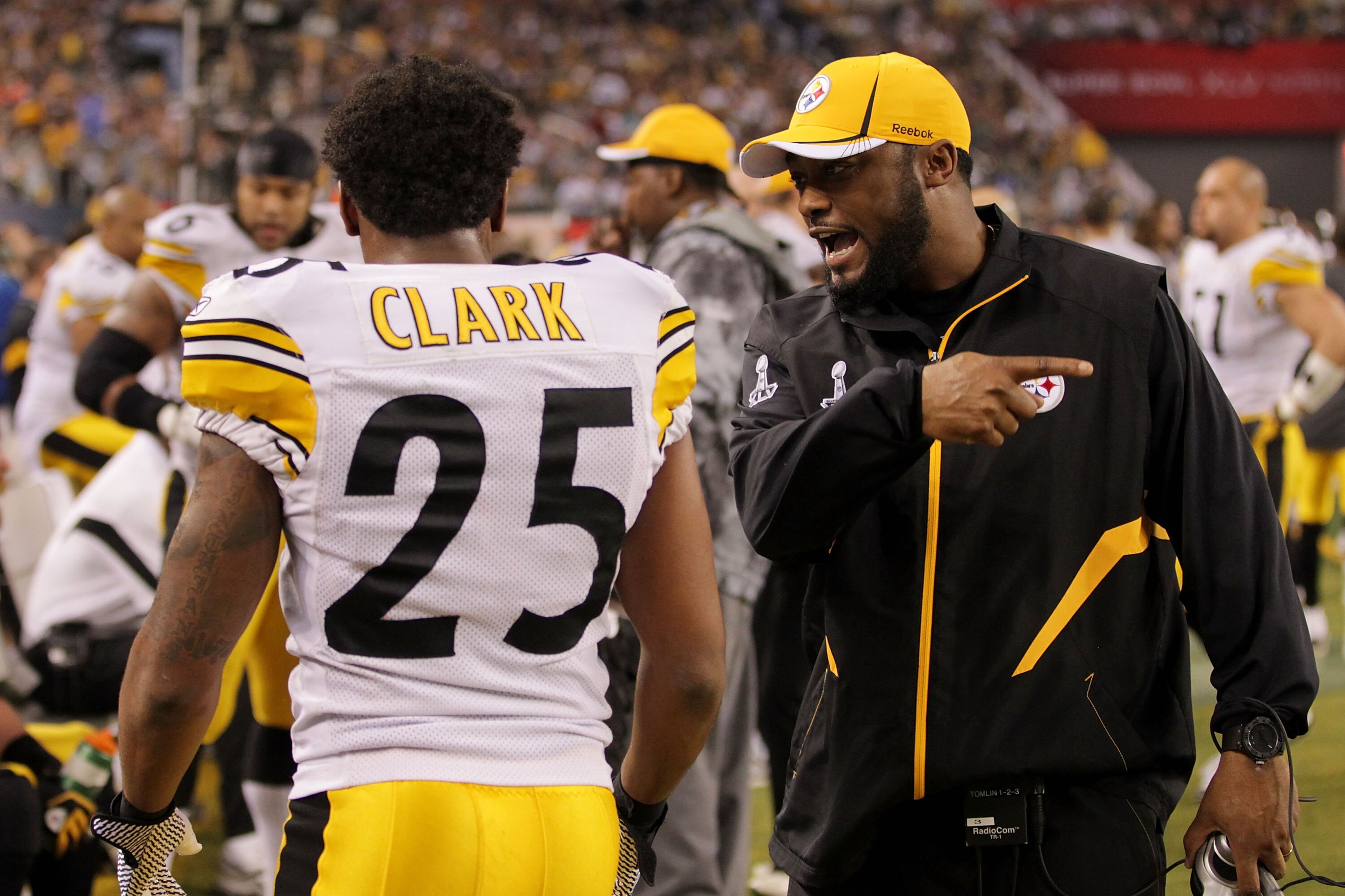 ARLINGTON, TX - FEBRUARY 06:  Head coach Mike Tomlin of the Pittsburgh Steelers talks to Ryan Clark #25 of the Pittsburgh Steelers as they play against the Green Bay Packers during Super Bowl XLV at Cowboys Stadium on February 6, 2011 in Arlington, Texas.