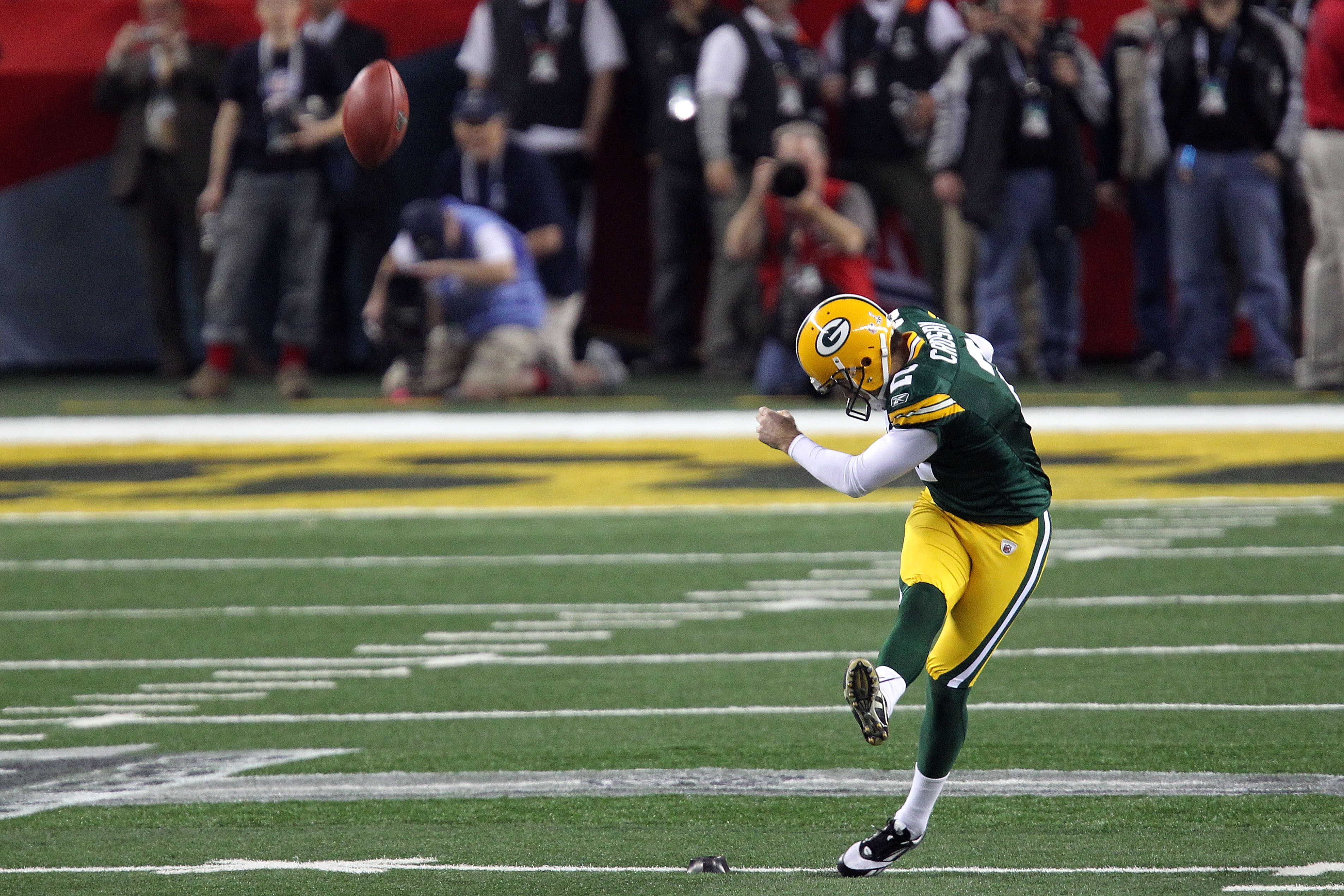 ARLINGTON, TX - FEBRUARY 06: Mason Crosby #2 of the Green Bay Packers kicks off to the Pittsburgh Steelers to start Super Bowl XLV at Cowboys Stadium on February 6, 2011 in Arlington, Texas.  (Photo by Mike Ehrmann/Getty Images)