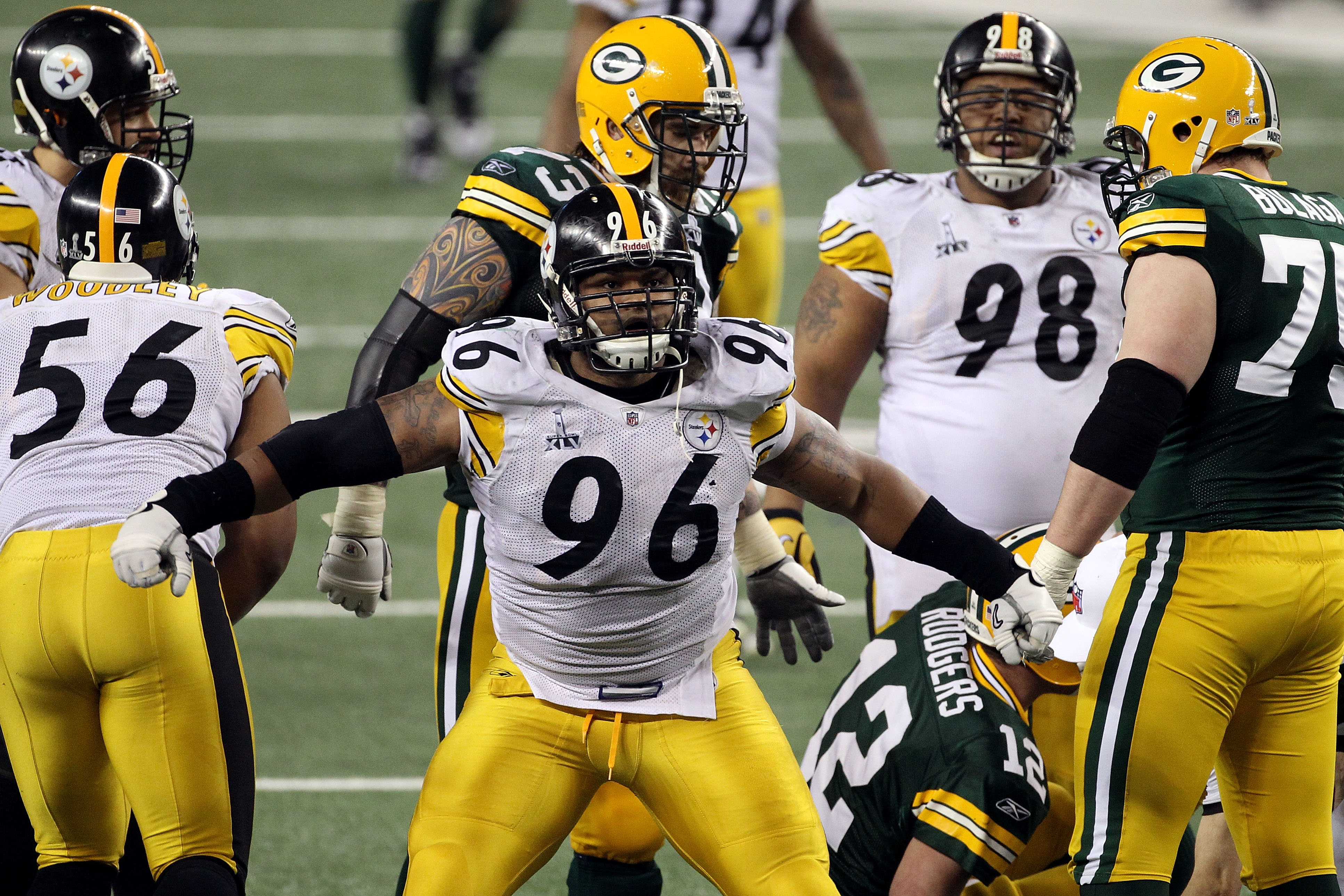 ARLINGTON, TX - FEBRUARY 06: Ziggy Hood #96 of the Pittsburgh Steelers reacts after sacking Aaron Rodgers #12 of the Green Bay Packers during Super Bowl XLV at Cowboys Stadium on February 6, 2011 in Arlington, Texas.  (Photo by Streeter Lecka/Getty Images