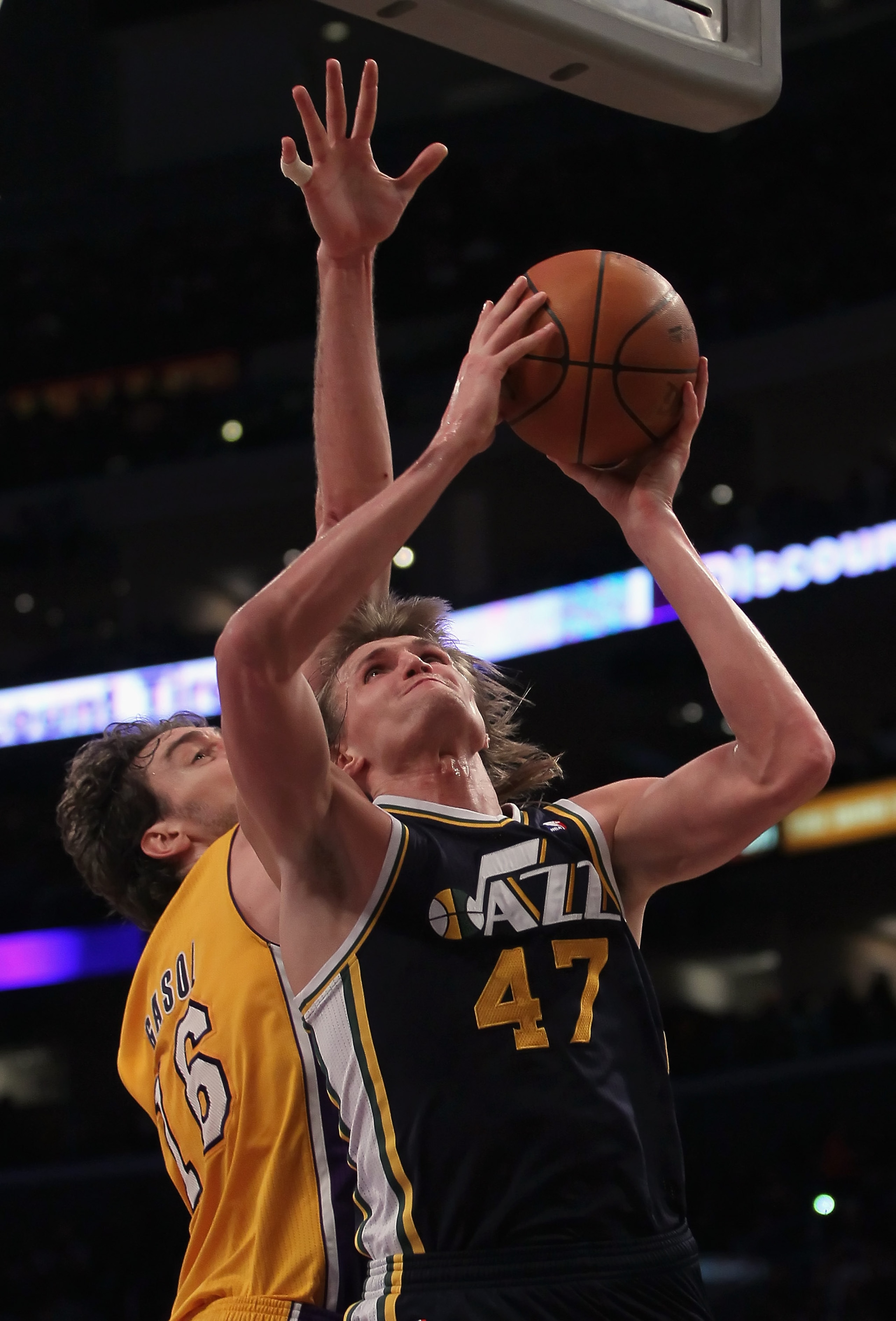 LOS ANGELES, CA - JANUARY 25:  Andrei Kirilenko #47 of the Utah Jazz drives to the basket past Pau Gasol #16 of the Los Angeles Lakers in the first half at Staples Center on January 25, 2011 in Los Angeles, California. NOTE TO USER: User expressly acknowl
