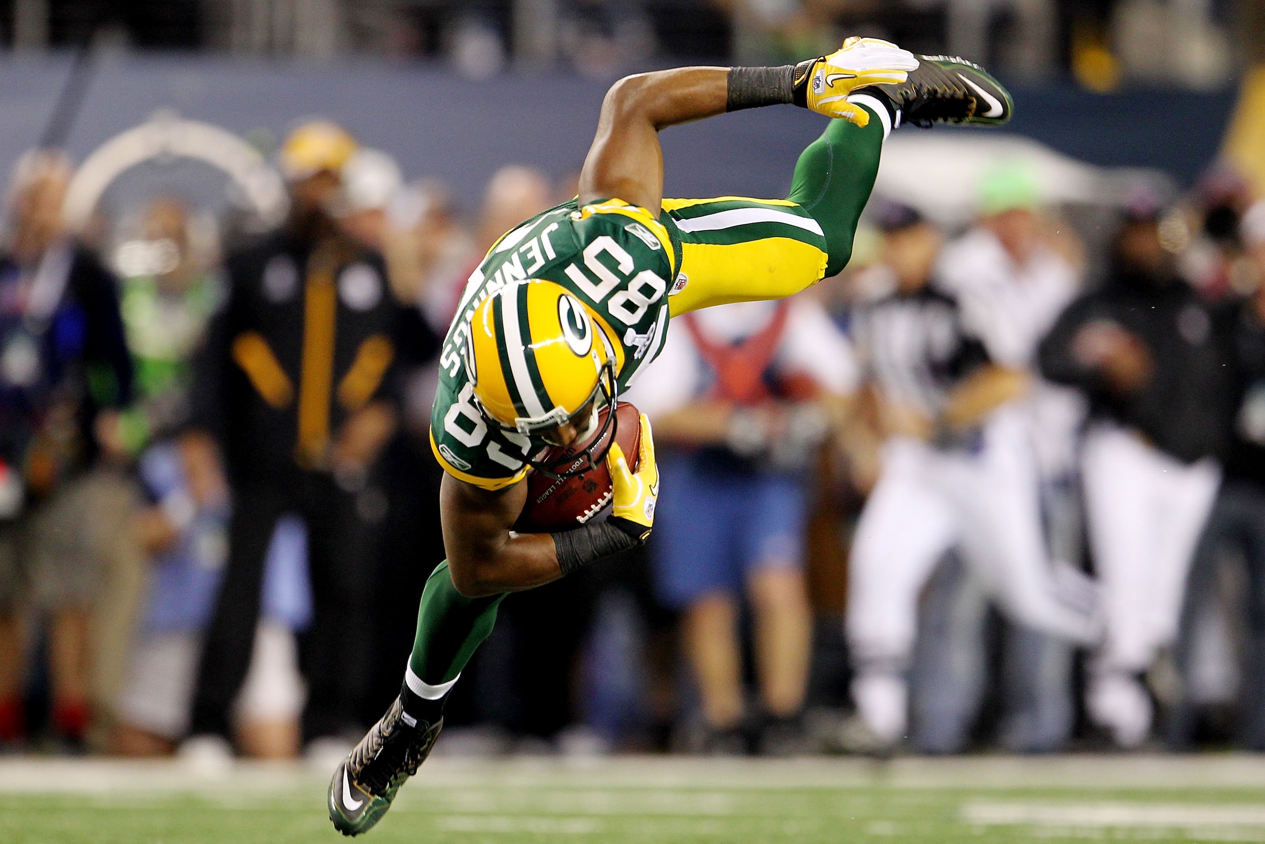 ARLINGTON, TX - FEBRUARY 06:  Greg Jennings #85 of the Green Bay Packers makes a first down catch in the fourth quarter during Super Bowl XLV at Cowboys Stadium on February 6, 2011 in Arlington, Texas.  (Photo by Jamie Squire/Getty Images)