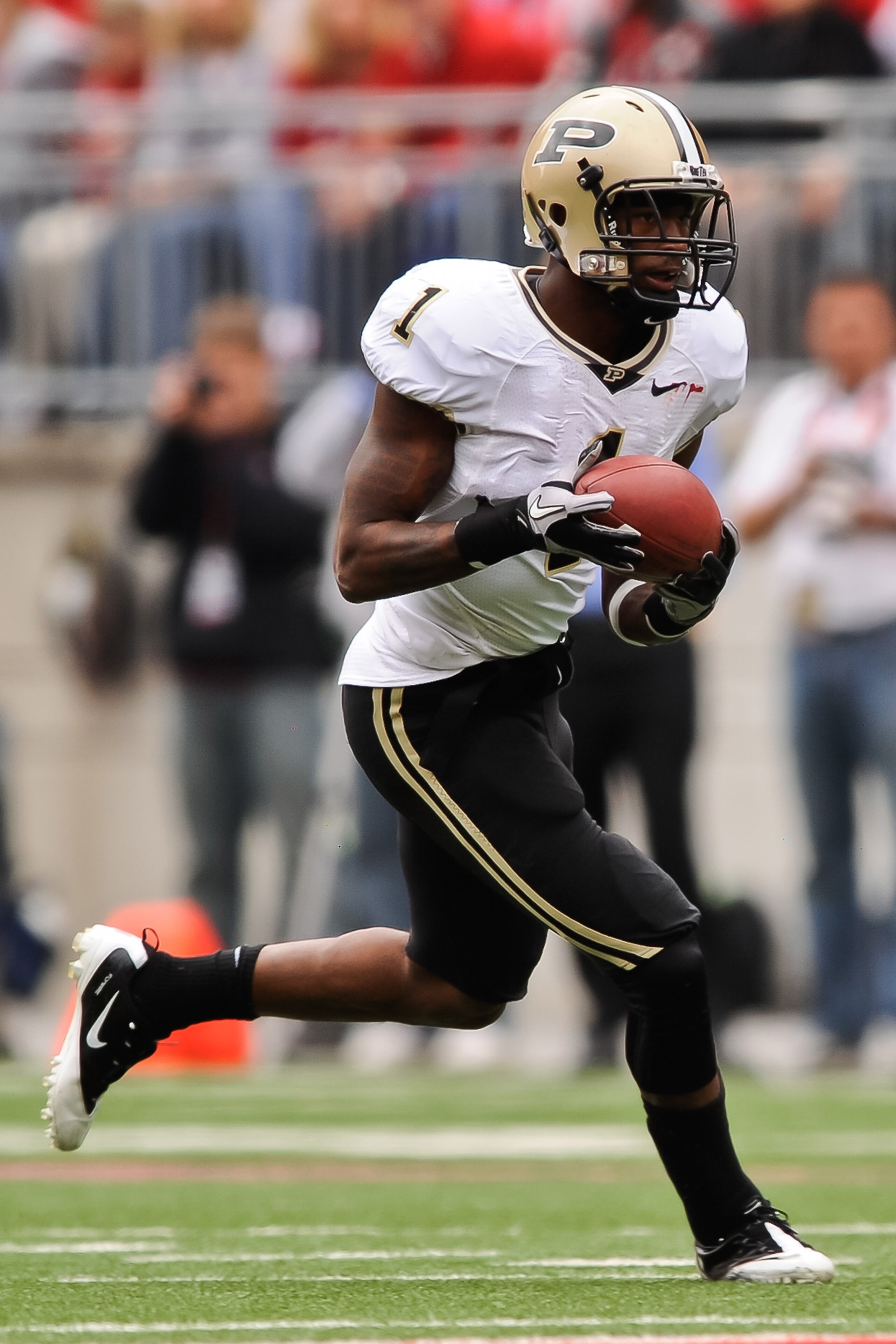 COLUMBUS, OH - OCTOBER 23: Keith Carlos #1 of the Purdue Boilermakers runs with the ball against the Ohio State Buckeyes at Ohio Stadium on October 23, 2010 in Columbus, Ohio. (Photo by Jamie Sabau/Getty Images) COLUMBUS, OH - OCTOBER 23: Keith Carlos #1 of the Purdue Boilermakers runs with the ball against the Ohio State Buckeyes at Ohio Stadium on October 23, 2010 in Columbus, Ohio. (Photo by Jamie Sabau/Getty Images)