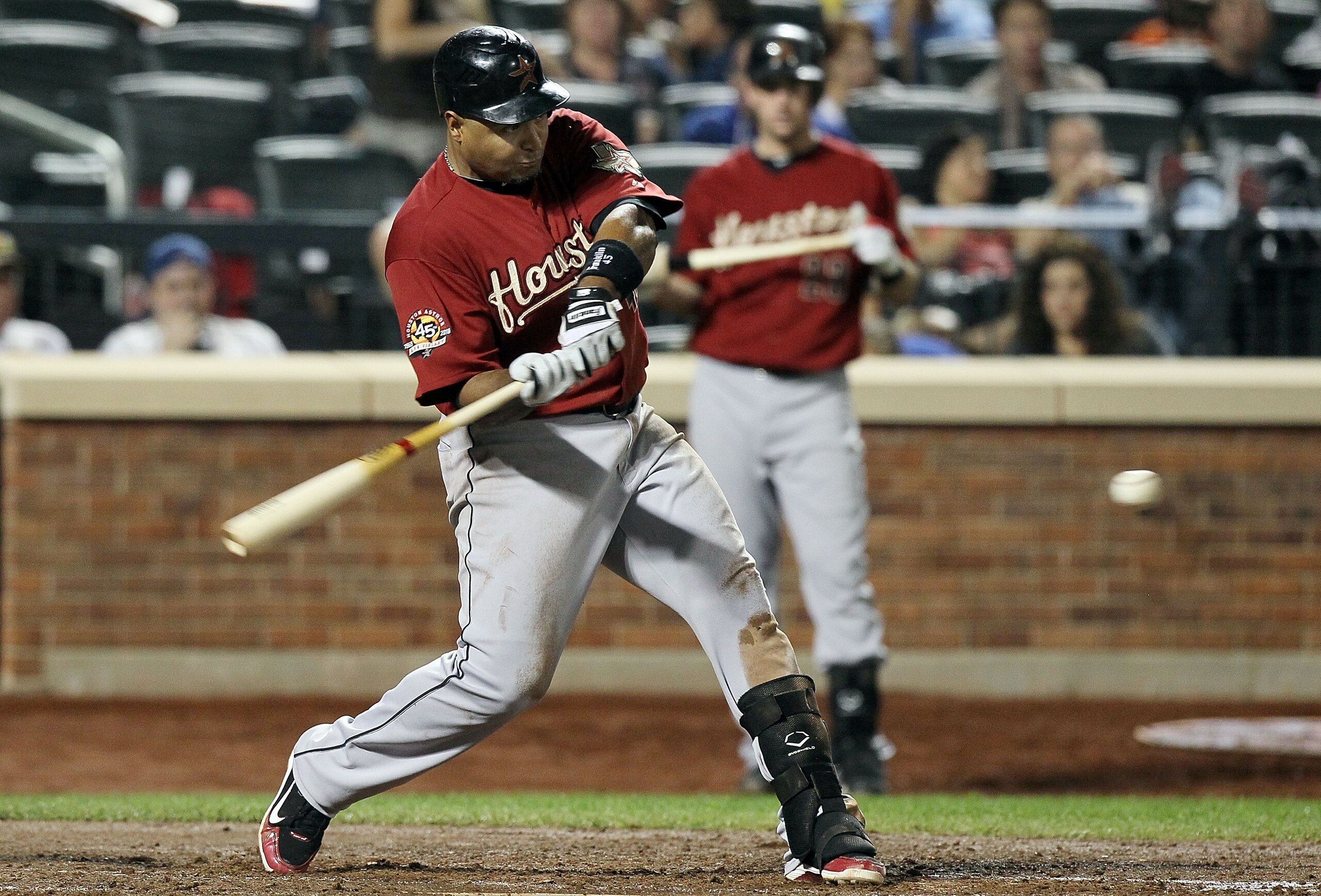 NEW YORK - AUGUST 28:  Carlos Lee #45 of the Houston Astros connects on a fifth inning two run home run against the New York Mets on August 28, 2010 at Citi Field in the Flushing neighborhood of the Queens borough of New York City.  (Photo by Jim McIsaac/