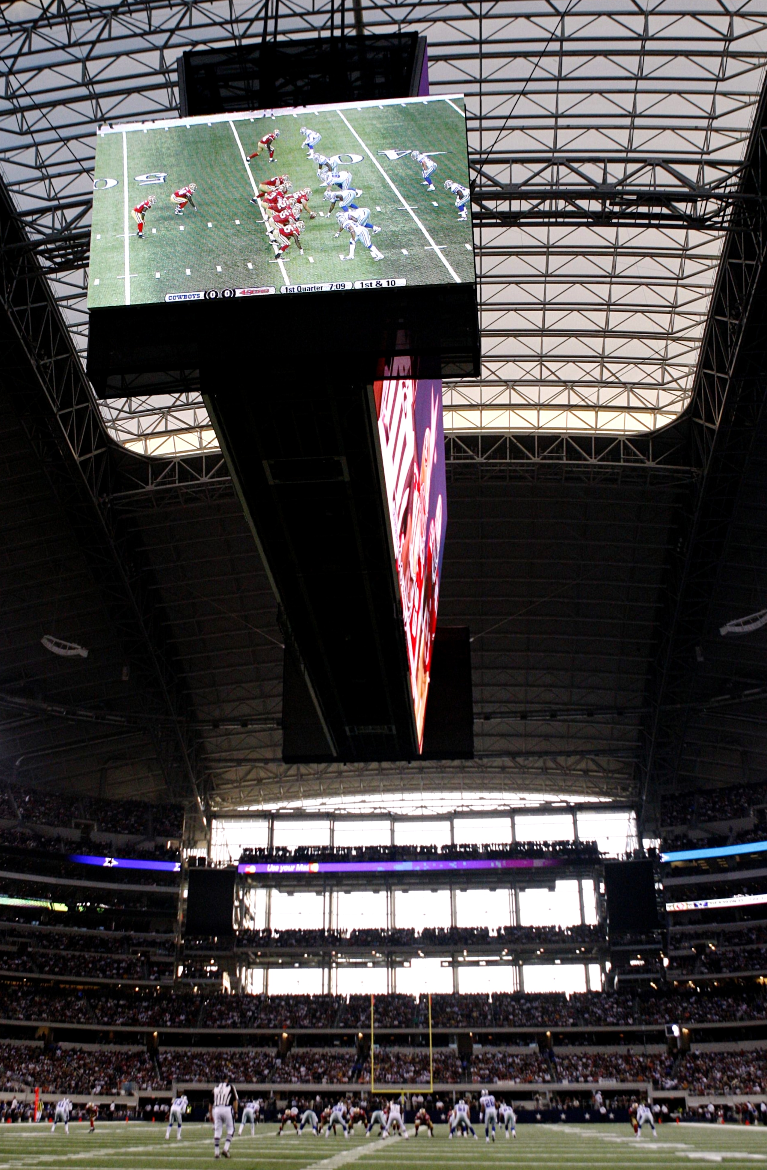 DALLAS - AUGUST 29:  The video screen is shown above the field during the preseason game between the San Francisco 49ers and the Dallas Cowboys at Cowboys Stadium on August 29, 2009 in Dallas, Texas.  (Photo by Ronald Martinez/Getty Images)