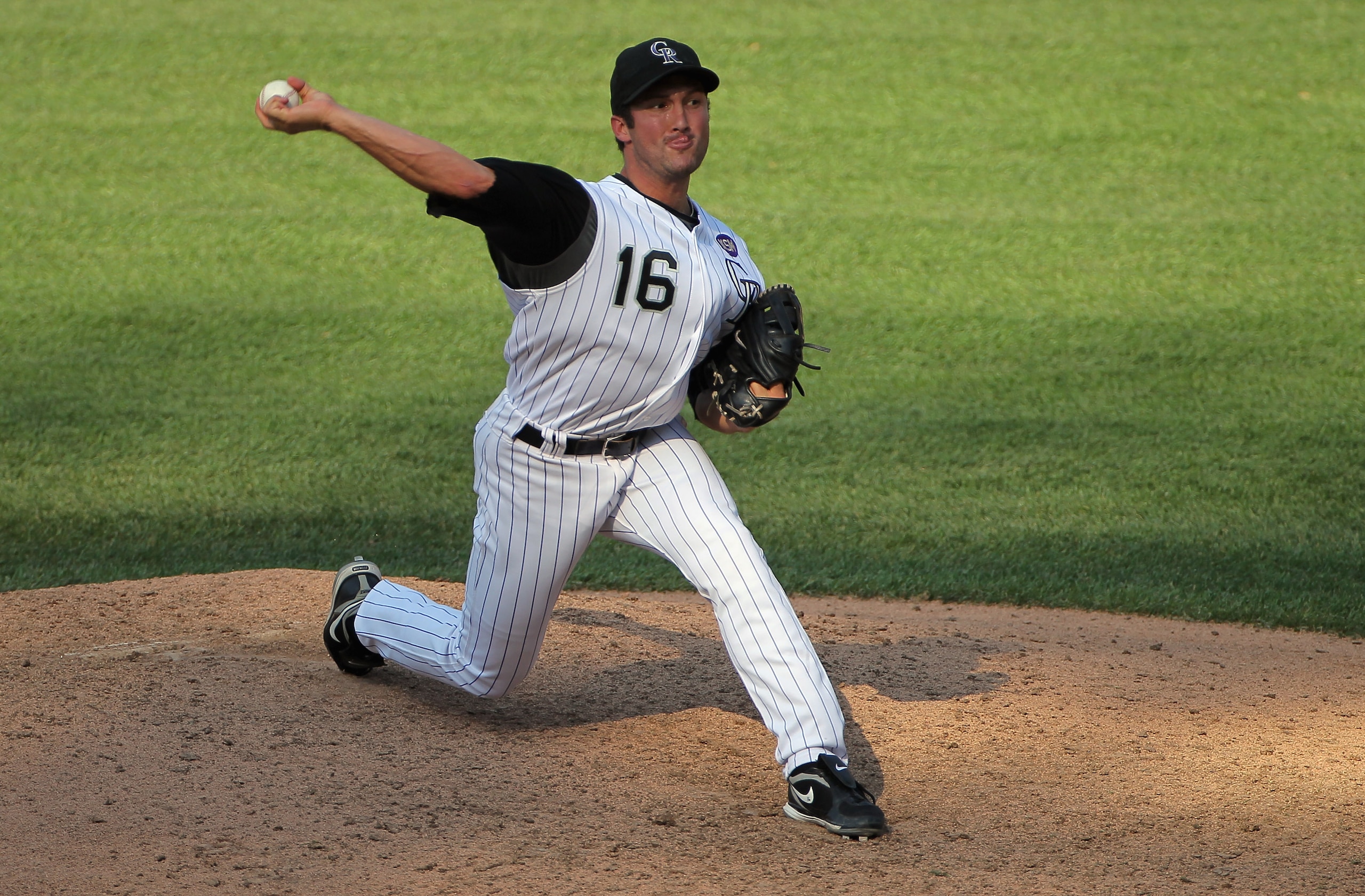 DENVER - SEPTEMBER 15:  Relief pitcher Huston Street #16 of the Colorado Rockies delivers against the San Diego Padres at Coors Field on September 15, 2010 in Denver, Colorado. Street earned a save as the Rockies defeated the Padres 9-6.  (Photo by Doug P