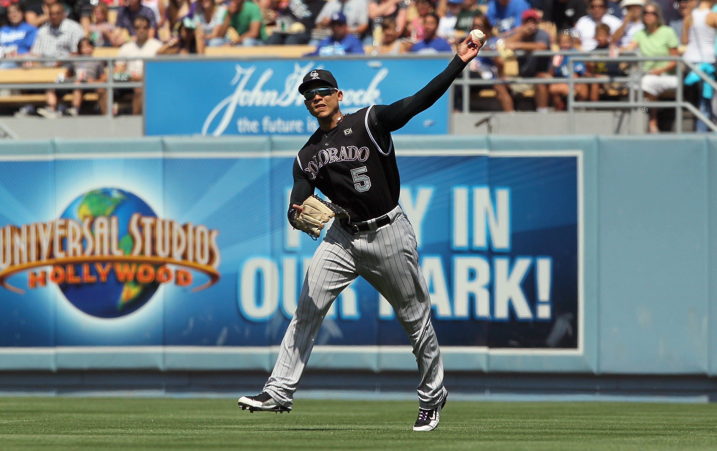 LOS ANGELES, CA - SEPTEMBER 18:  Carlos Gonzalez #5 of the Colorado Rockies plays against the Los Angeles Dodgers in the game at Dodger Stadium on September 18, 2010 in Los Angeles, California.  (Photo by Jeff Gross/Getty Images)