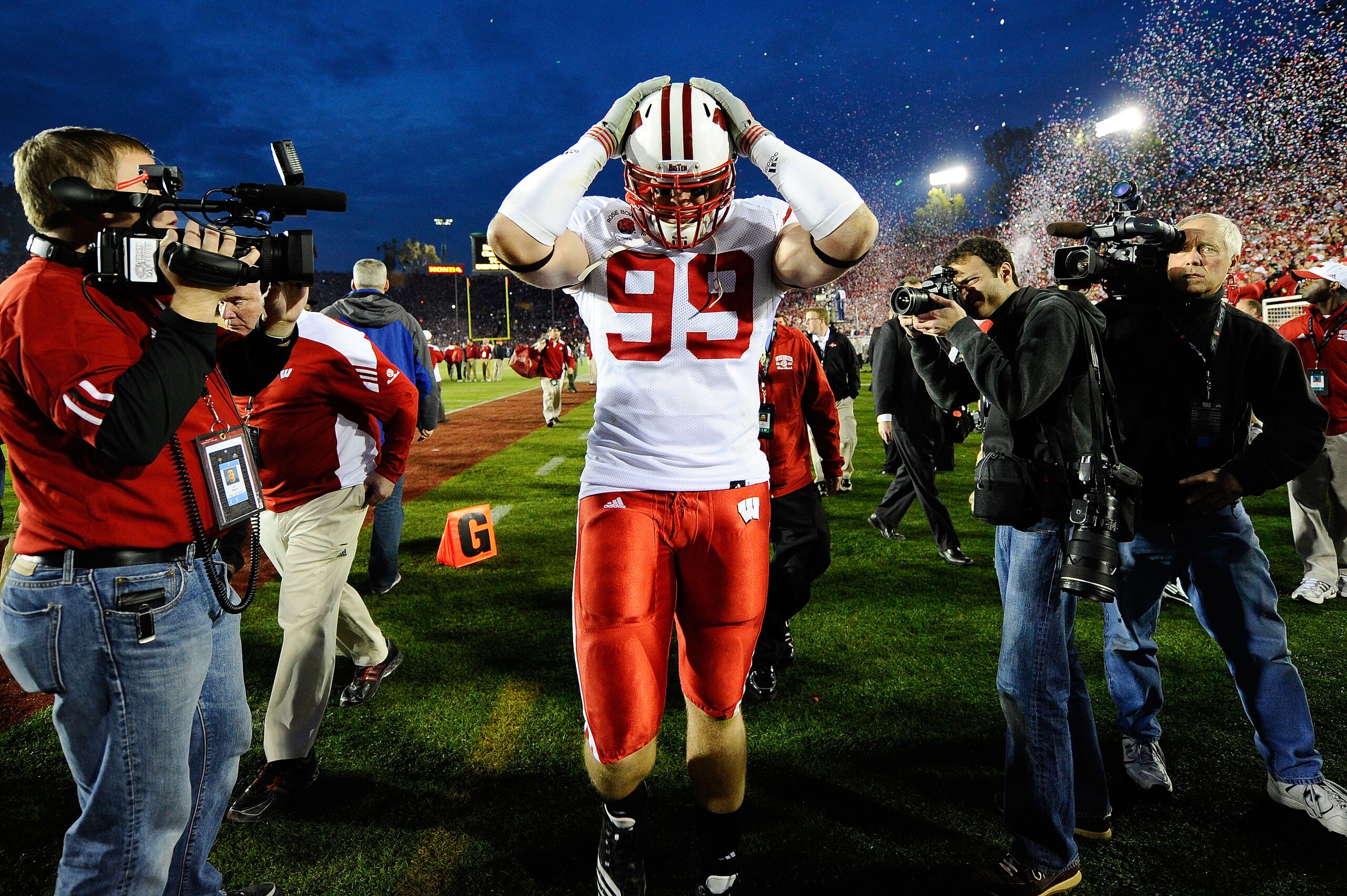 PASADENA, CA - JANUARY 01:  Defensive lineman J.J. Watt #99 of the Wisconsin Badgers walks off the field after losing 21-19 to the TCU Horned Frogs in the 97th Rose Bowl game on January 1, 2011 in Pasadena, California.  (Photo by Kevork Djansezian/Getty I