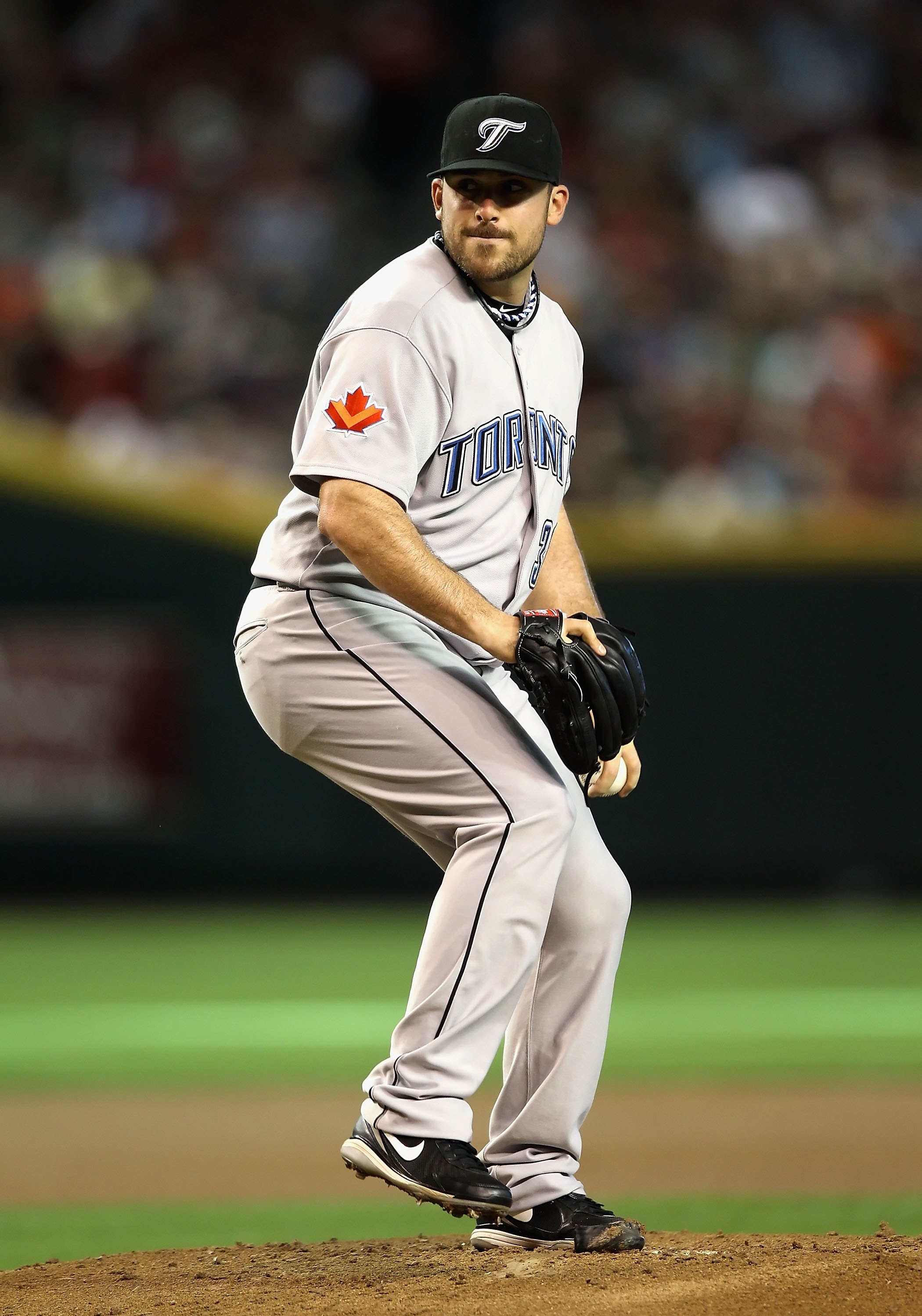 PHOENIX - MAY 22:  Starting pitcher Dana Eveland #30 of the Toronto Blue Jays pitches against the Arizona Diamondbacks during the Major League Baseball game at Chase Field on May 22, 2010 in Phoenix, Arizona.  The Diamondbacks defeated the Blue Jays 8-5.
