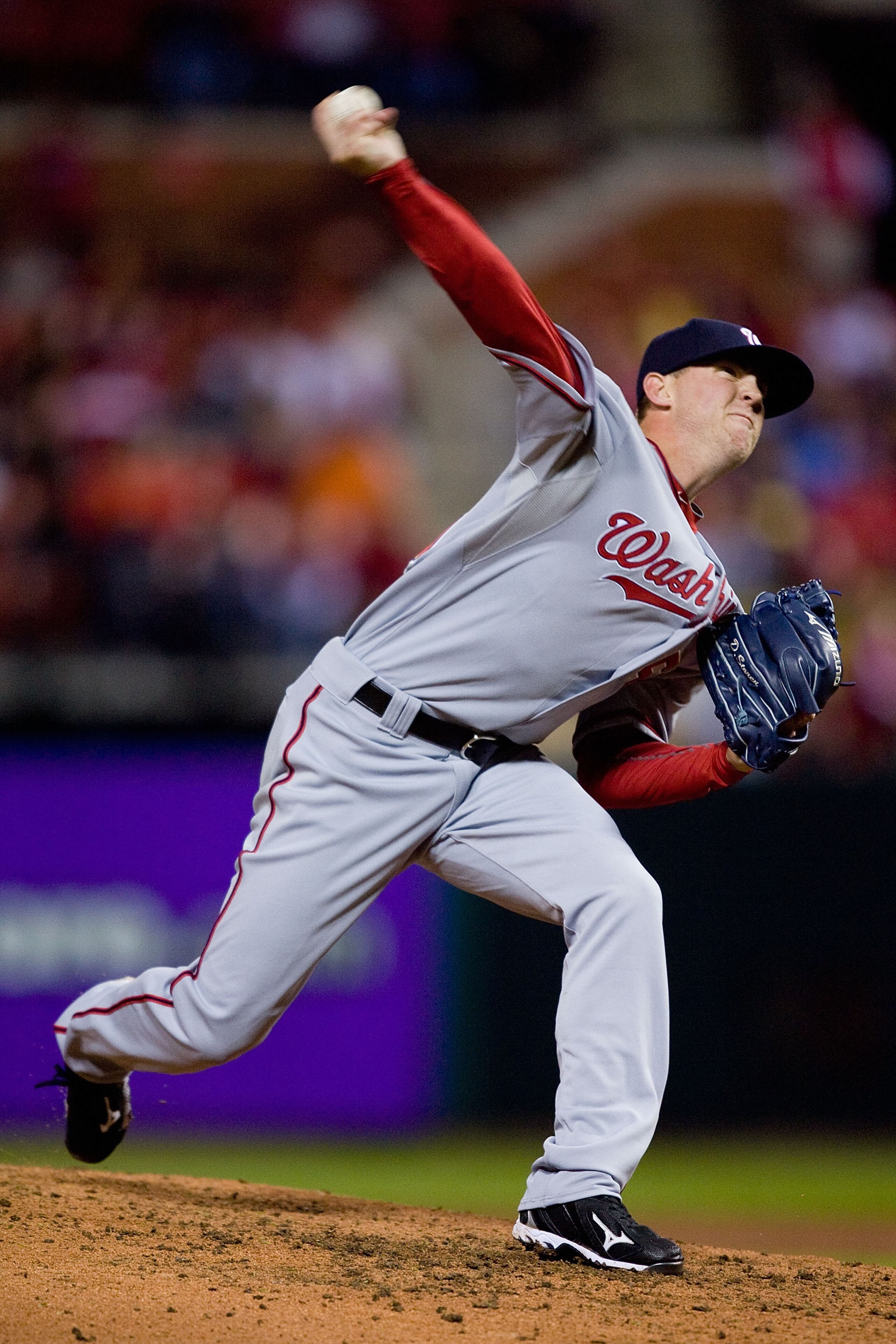 ST. LOUIS - MAY 17: Relief pitcher Drew Storen #58 of the Washington Nationals throws against the St. Louis Cardinals at Busch Stadium on May 17, 2010 in St. Louis, Missouri.  The Cardinals defeated the Nationals 6-2.  (Photo by Dilip Vishwanat/Getty Imag