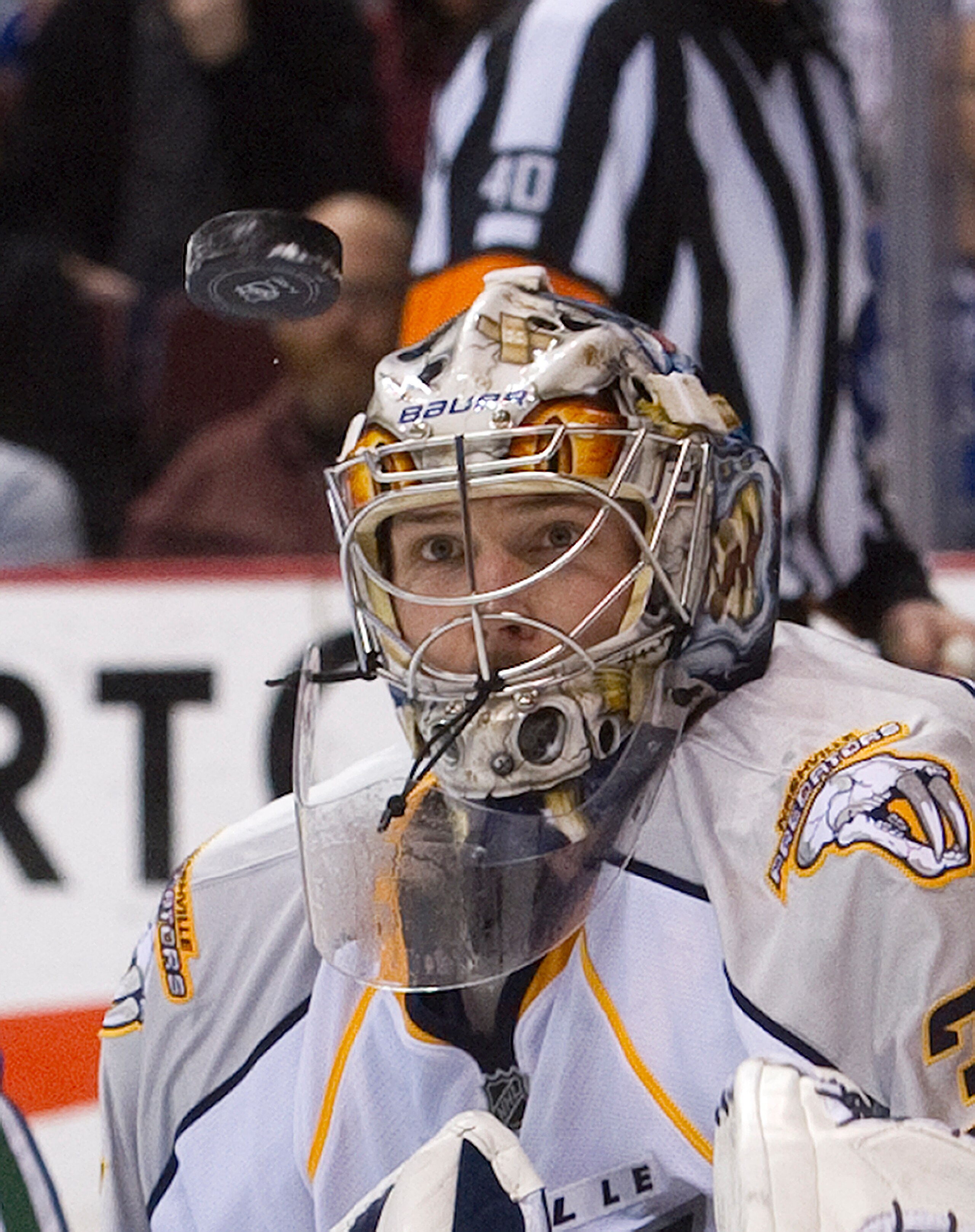 VANCOUVER, CANADA - JANUARY 26: Goalie Pekka Rinne #35 of the Nashville Predators keeps an eye on the airborne puck after making a save against the Vancouver Canucks during the second period in NHL action on January 26, 2011 at Rogers Arena in Vancouver,