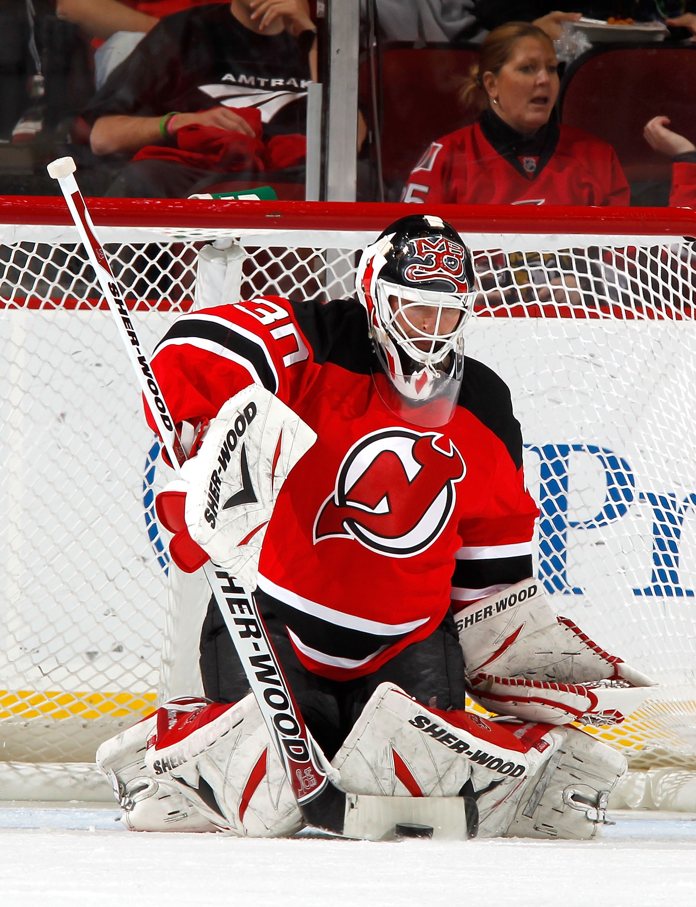 NEWARK, NJ - FEBRUARY 01:  Goalie Martin Brodeur #30 of the New Jersey Devils makes a save during an NHL hockey game against the Ottawa Senators at the Prudential Center on February 1, 2011 in Newark, New Jersey.  (Photo by Paul Bereswill/Getty Images)