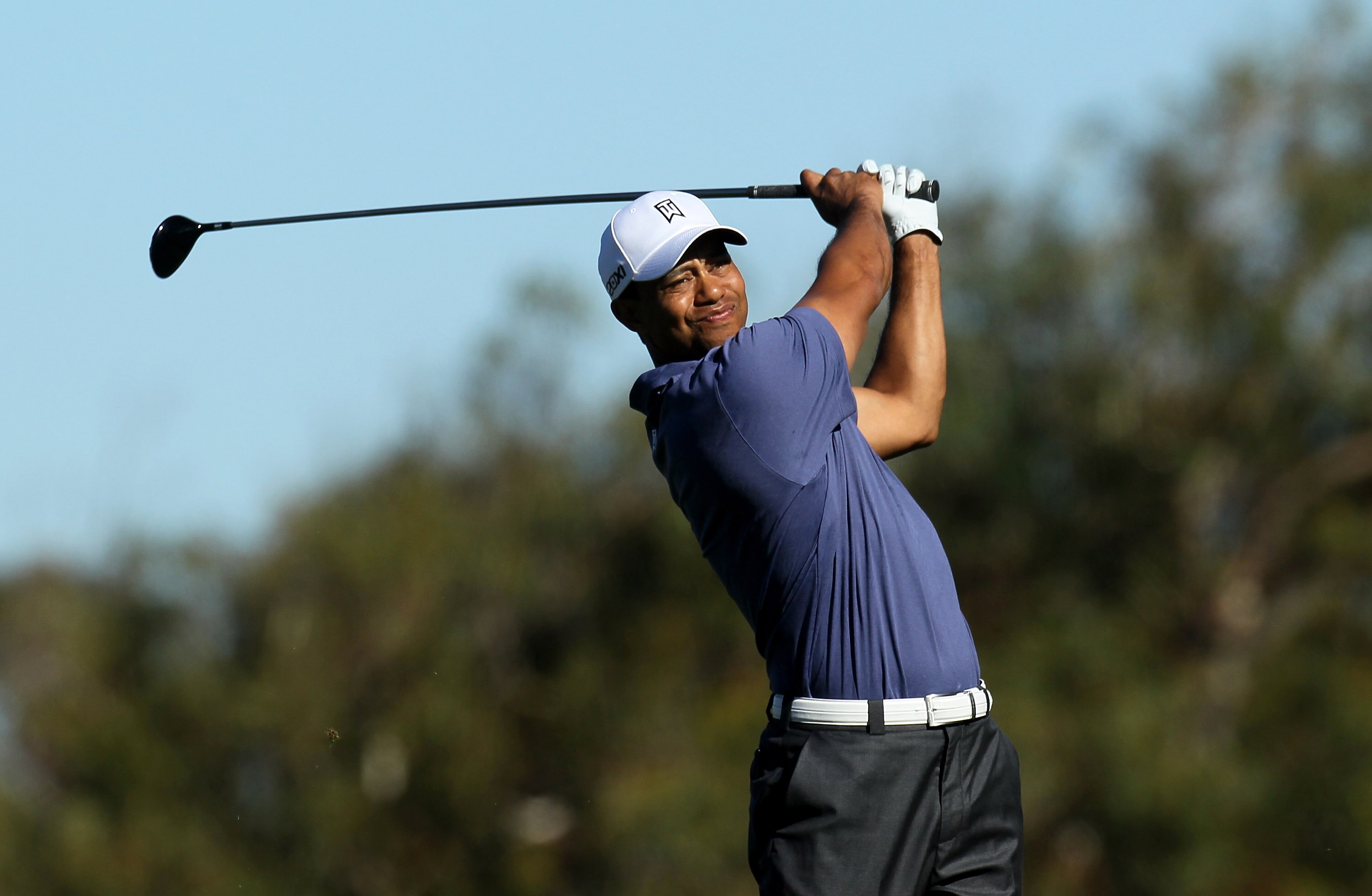 LA JOLLA, CA - JANUARY 28: Tiger Woods hits his tee shot on the second hole during round two of the Farmers Insurance Open at Torrey Pines South Course on January 28, 2011 in La Jolla, California. (Photo by Stephen Dunn/Getty Images) LA JOLLA, CA - JANUARY 28: Tiger Woods hits his tee shot on the second hole during round two of the Farmers Insurance Open at Torrey Pines South Course on January 28, 2011 in La Jolla, California. (Photo by Stephen Dunn/Getty Images)