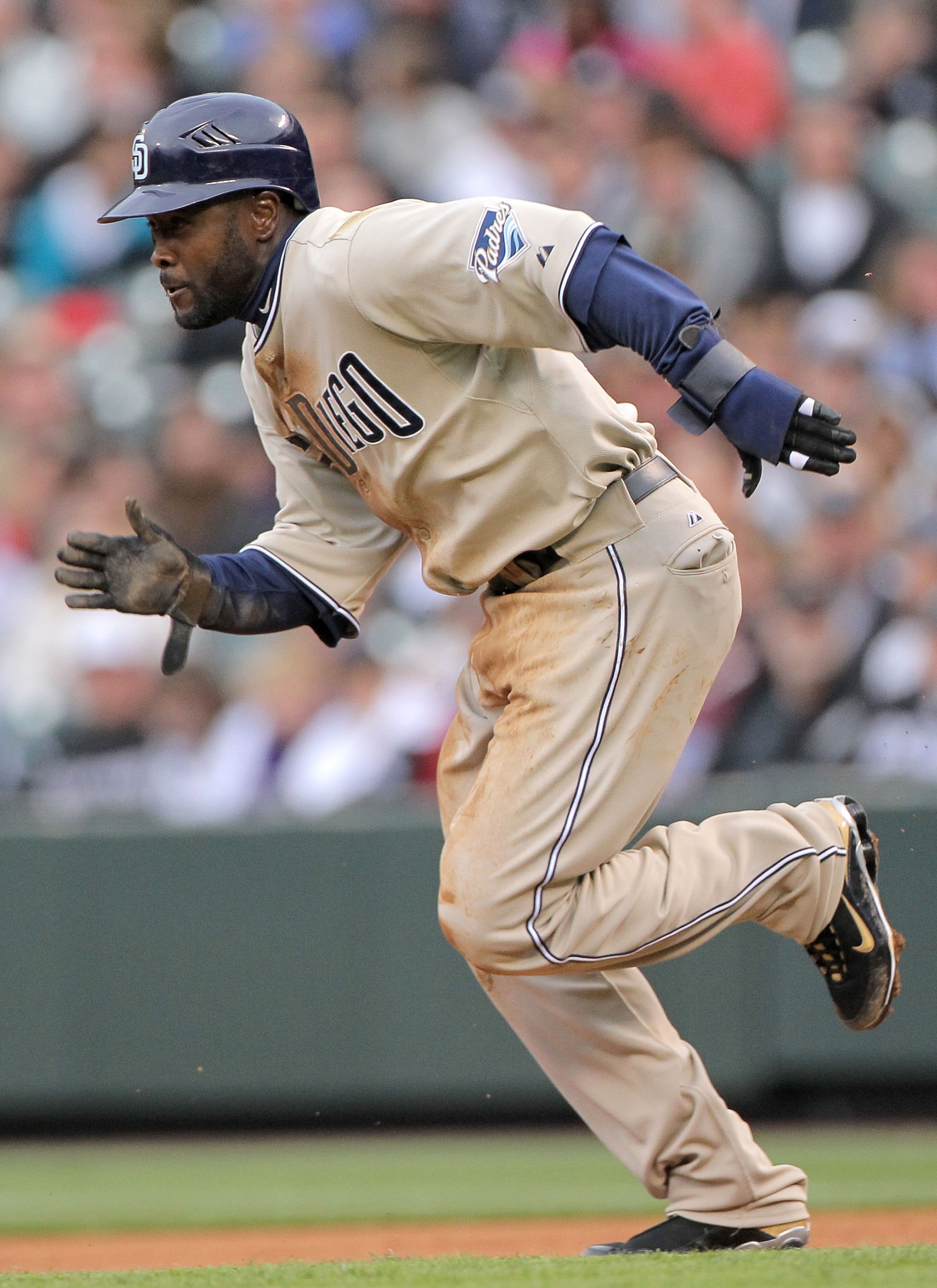 DENVER - APRIL 10:  Centerfielder Tony Gwynn Jr. #18 of the San Diego Padres steals secondbase against starting pitcher Jason Hammel of the Colorado Rockies during MLB action at Coors Field on April 10, 2010 in Denver, Colorado. The Padres defeated the Ro