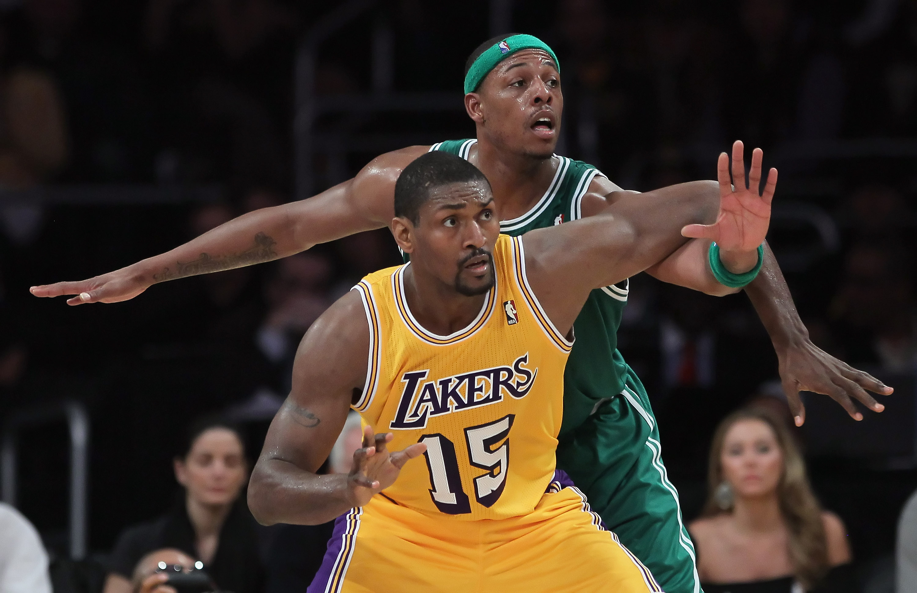 LOS ANGELES, CA - JANUARY 30:  Paul Pierce #34 of the Boston Celtics and Ron Artest #15 of the Los Angeles Lakers fight for position in the second half at Staples Center on January 30, 2011 in Los Angeles, California. The Celtics defeated the Lakers 109-9
