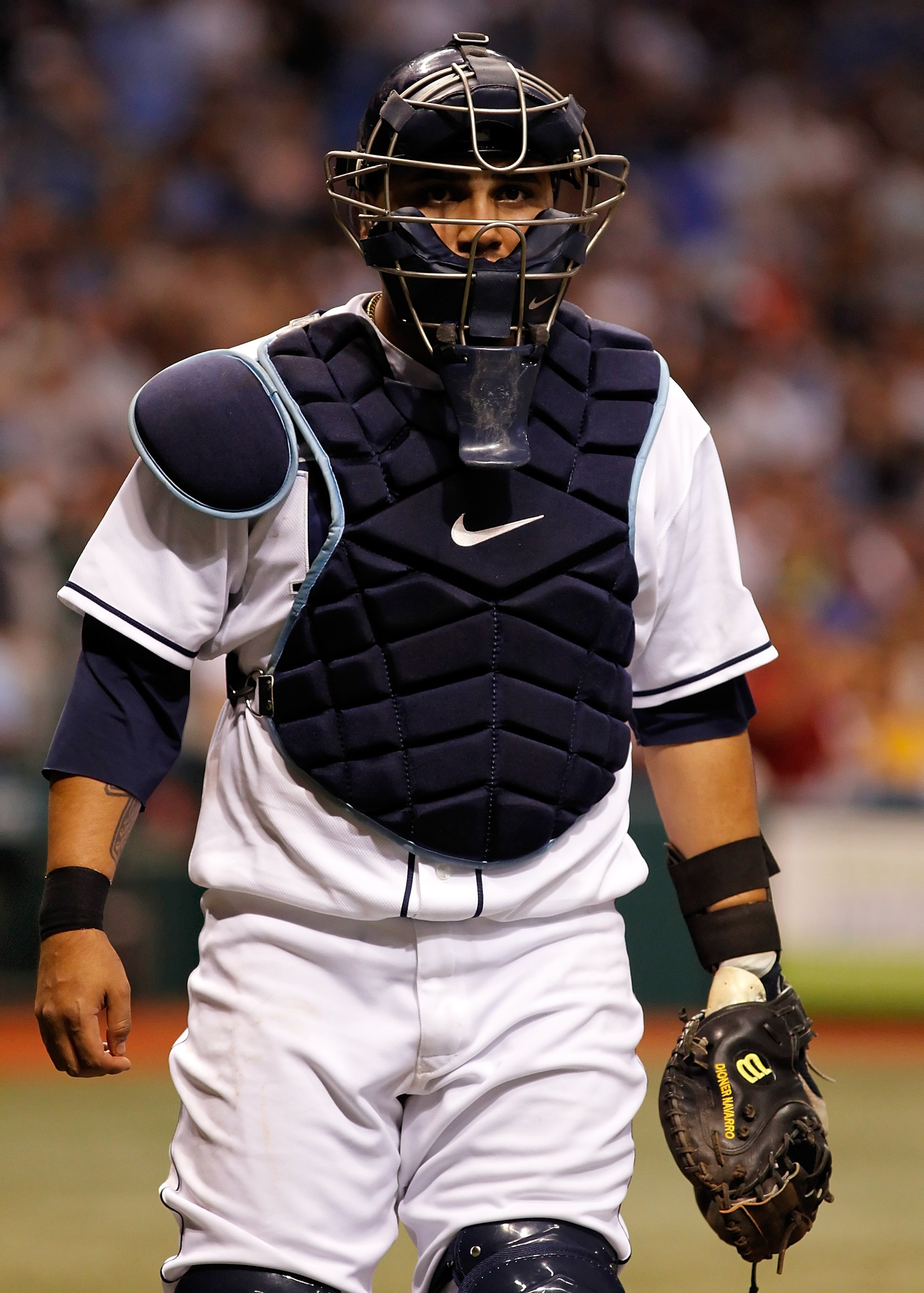 ST. PETERSBURG - APRIL 23: Catcher Dioner Navarro #30 of the Tampa Bay Rays walks back to the dugout during the game against the Toronto Blue Jays at Tropicana Field on April 23, 2010 in St. Petersburg, Florida. (Photo by J. Meric/Getty Images) ST. PETERSBURG - APRIL 23: Catcher Dioner Navarro #30 of the Tampa Bay Rays walks back to the dugout during the game against the Toronto Blue Jays at Tropicana Field on April 23, 2010 in St. Petersburg, Florida. (Photo by J. Meric/Getty Images)