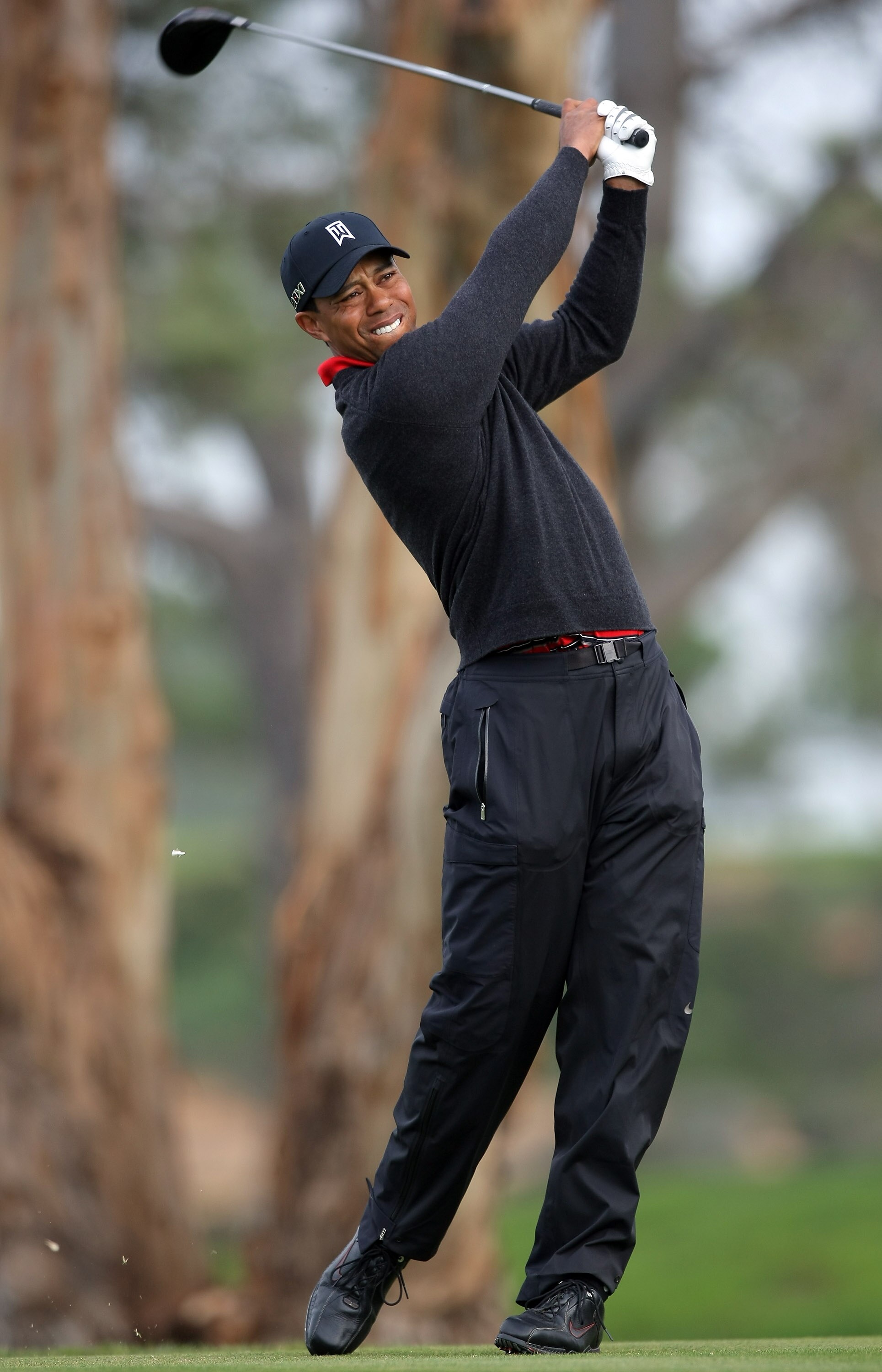 LA JOLLA, CA - JANUARY 30:  Tiger Woods tees off the 5th hole during the final round of the Farmers Insurance Open at the Torrey Pines South Course on January 30, 2011 in La Jolla, California.  (Photo by Donald Miralle/Getty Images)