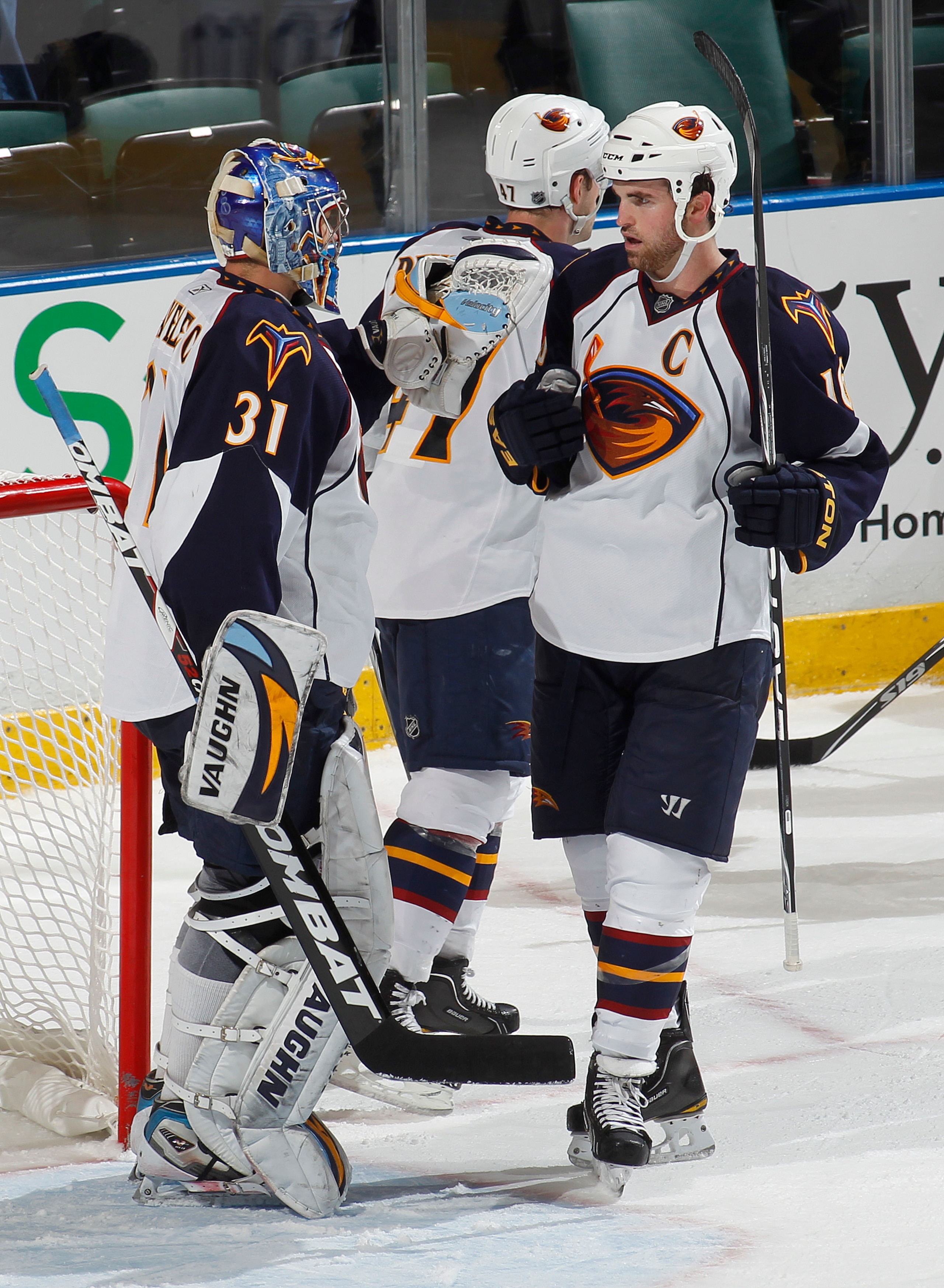 SUNRISE, FL - JANUARY 5: Goaltender Ondrej Pavelec #31 is congratulated by Andrew Ladd #16 of the Atlanta Thrashers after defeating the Florida Panthers 3-2 on January 5, 2011 at the BankAtlantic Center in Sunrise, Florida.  (Photo by Joel Auerbach/Getty