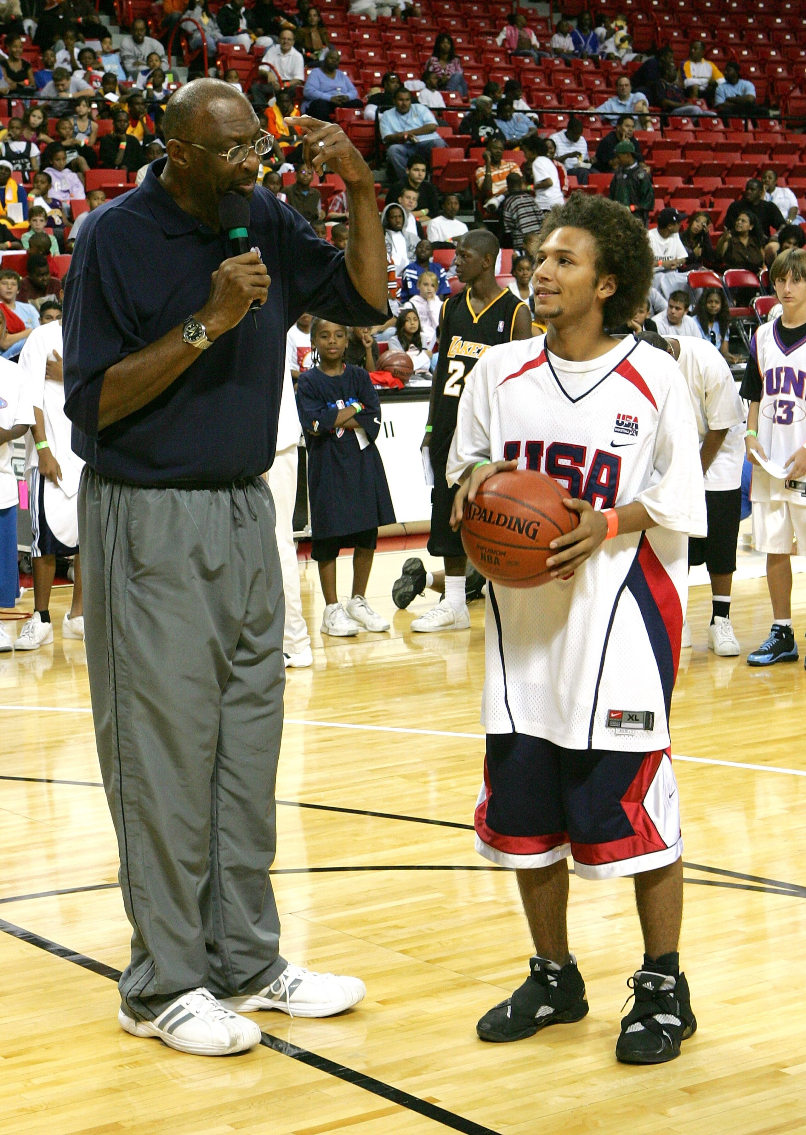 LAS VEGAS - OCTOBER 15:  NBA legend Bob Lanier (L) gives 16-year-old LeRon Albright of Las Vegas pointers on shooting free throws during the tip-off of the 2006-2007 Jr. NBA/Jr. WNBA season prior to the Los Angeles Lakers and Phoenix Suns preseason game a