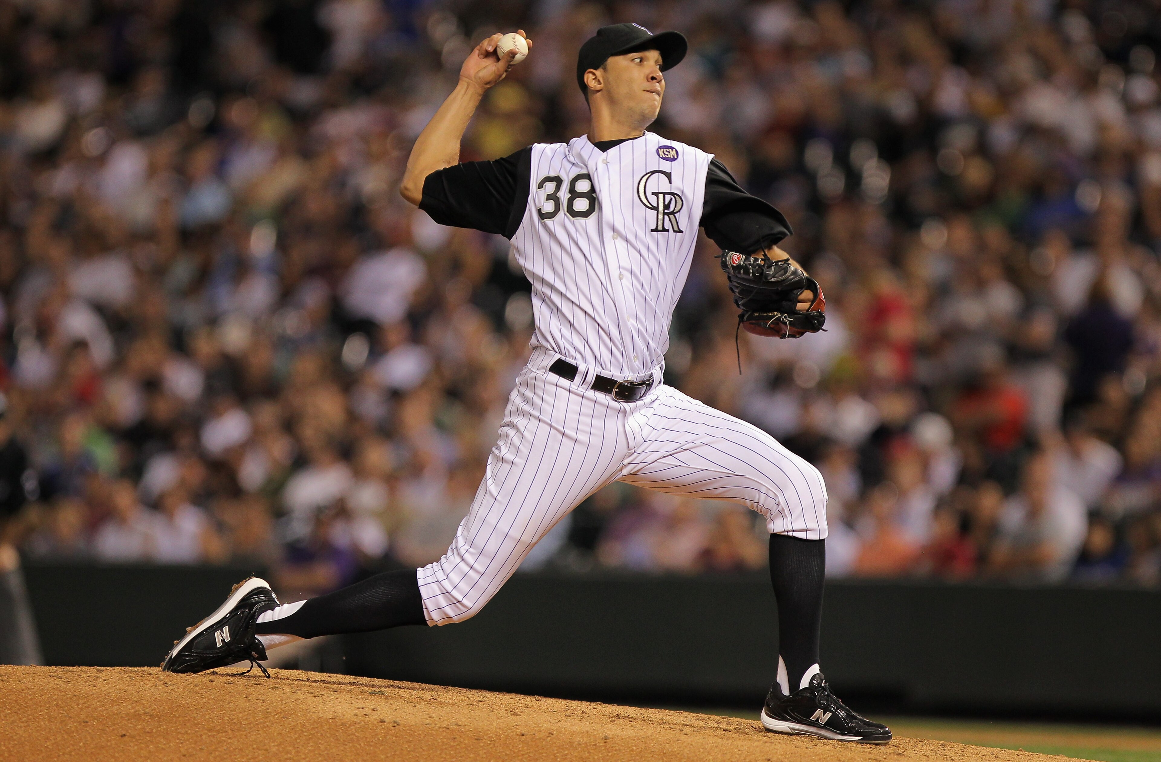 DENVER - SEPTEMBER 27:  Starting pitcher Ubaldo Jimenez #38 of the Colorado Rockies works against the Los Angeles Dodgers at Coors Field on September 25, 2010 in Denver, Colorado. Jiimenez failed to earn his 20th win of the season as the Dodgers defeated