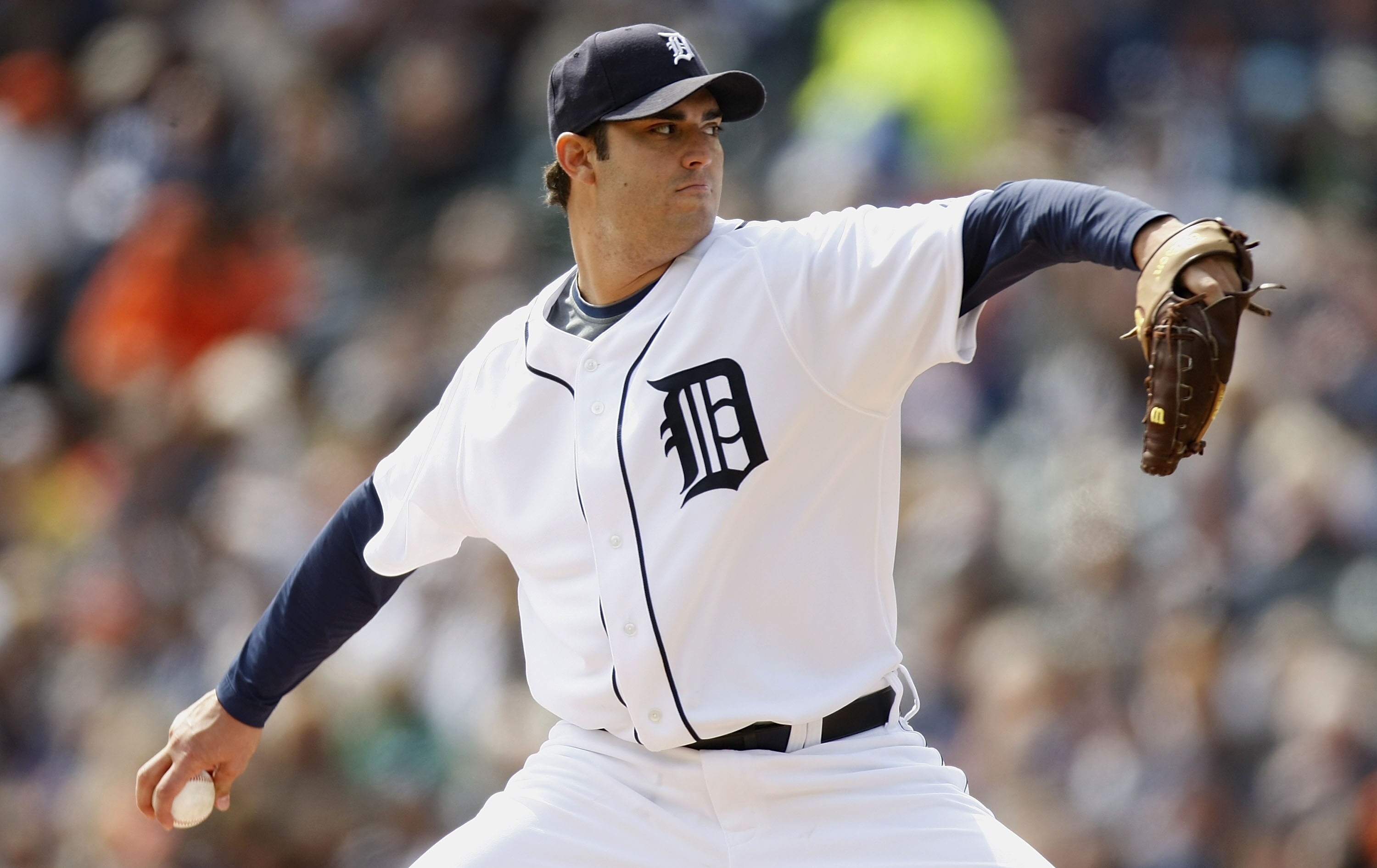 DETROIT - APRIL 10:  Armando Galarraga #58 of the Detroit Tigers throws a fourth inning pitch while playing the Texas Rangers during Opening Day on April 10, 2009 at Comerica Park in Detroit, Michigan. Detroit won the game 15-2.  (Photo by Gregory Shamus/