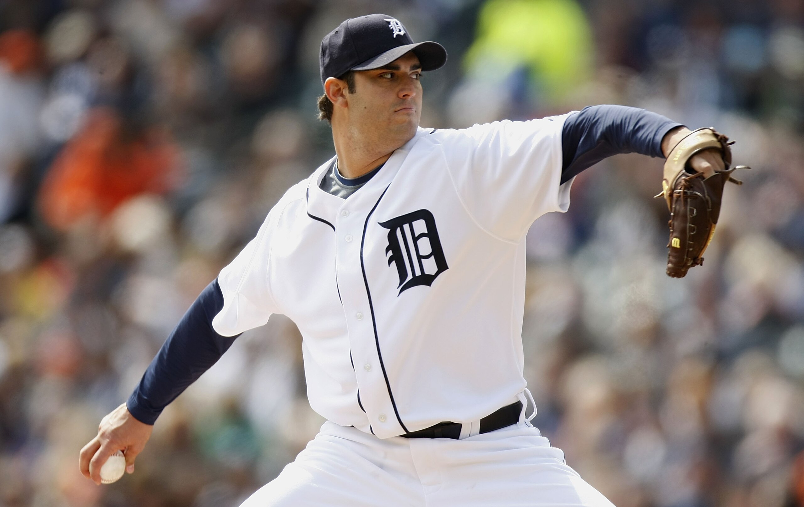 DETROIT - APRIL 10:  Armando Galarraga #58 of the Detroit Tigers throws a fourth inning pitch while playing the Texas Rangers during Opening Day on April 10, 2009 at Comerica Park in Detroit, Michigan. Detroit won the game 15-2.  (Photo by Gregory Shamus/