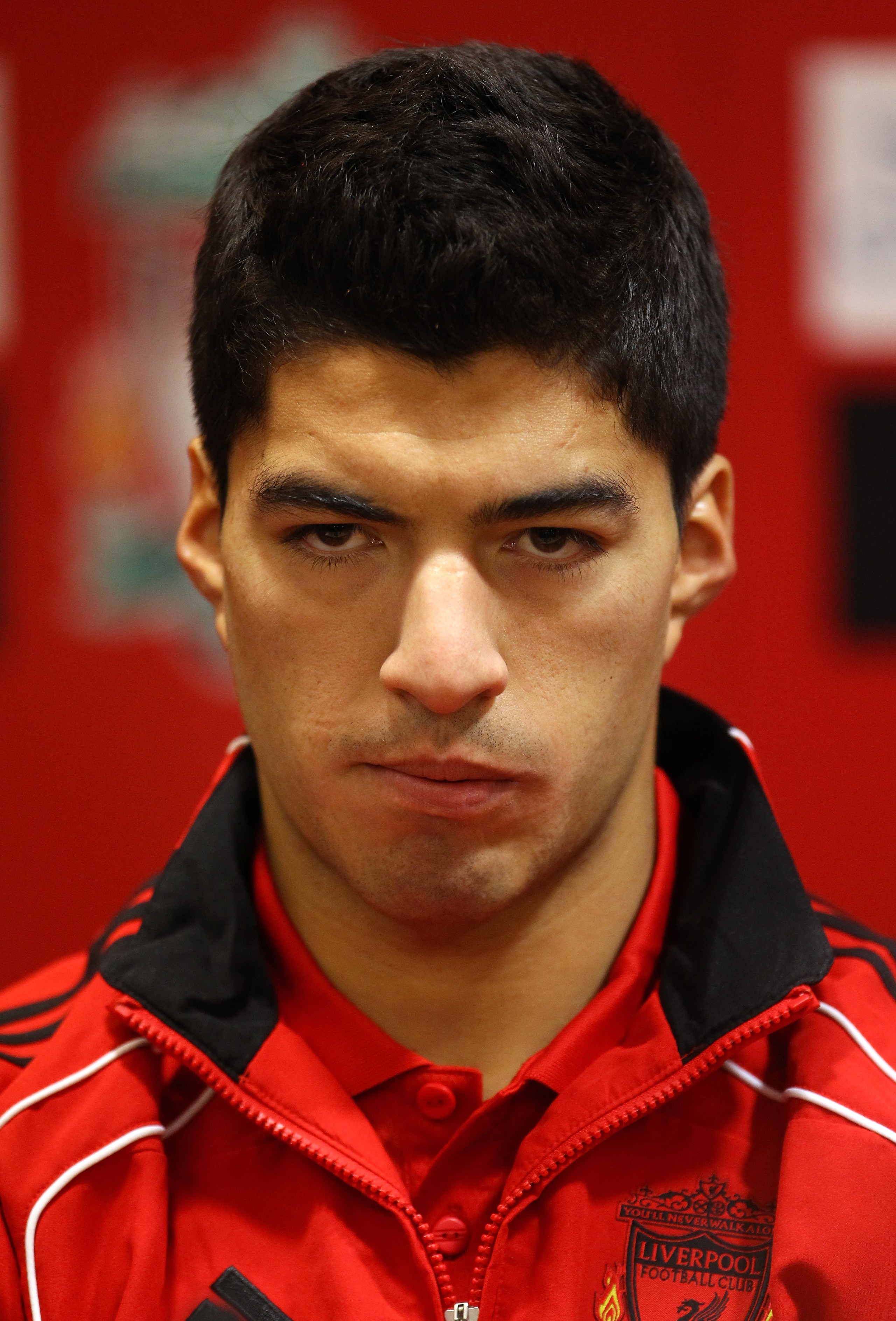 LIVERPOOL, ENGLAND - FEBRUARY 03: New signing Luis Suarezl of Liverpool faces the media during a press conference at Anfield on February 3, 2011 in Liverpool, England. (Photo by Alex Livesey/Getty Images) LIVERPOOL, ENGLAND - FEBRUARY 03: New signing Luis Suarezl of Liverpool faces the media during a press conference at Anfield on February 3, 2011 in Liverpool, England. (Photo by Alex Livesey/Getty Images)