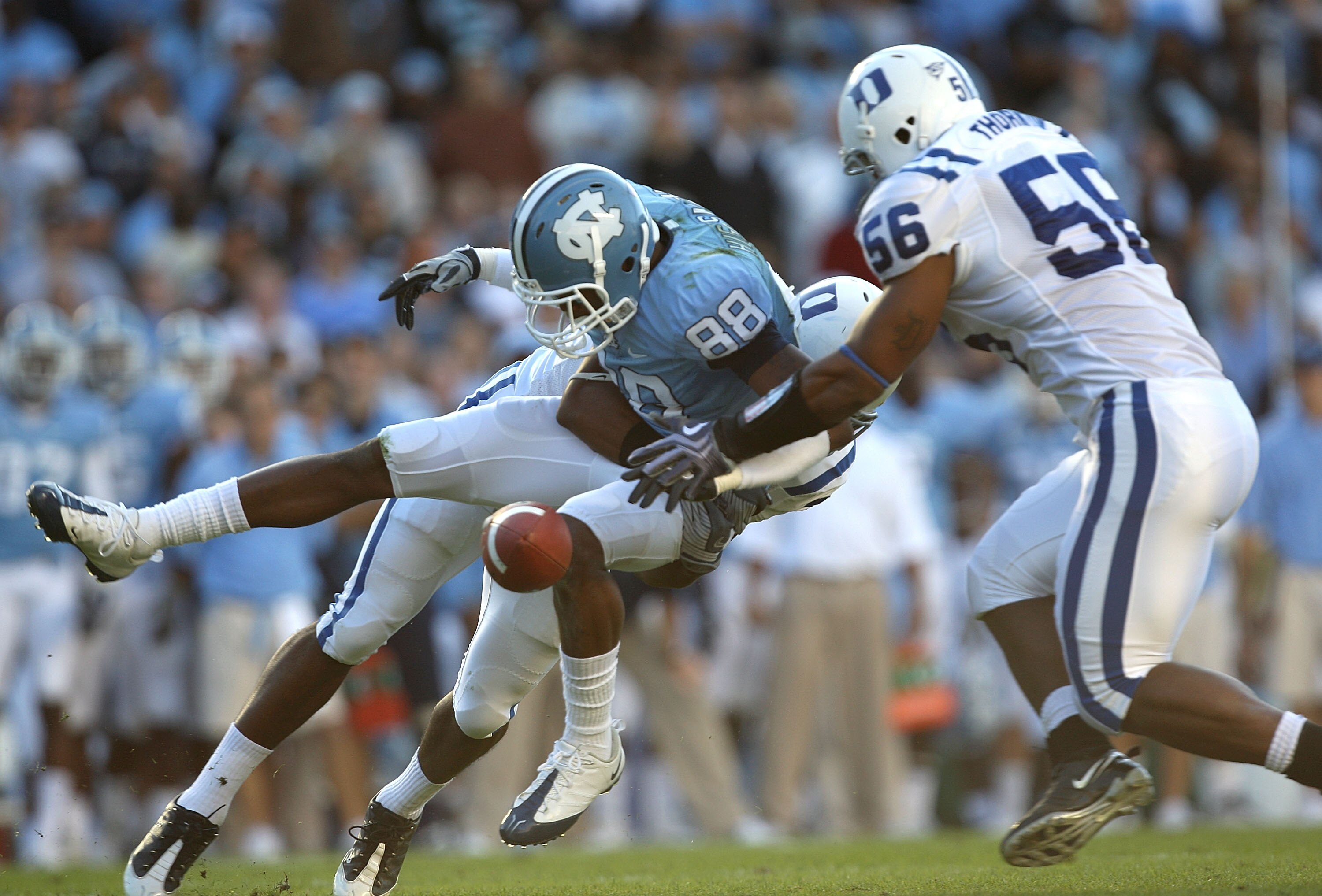 CHAPEL HILL, NC - NOVEMBER 07:  Damian Thornton #56 of the Duke Blue Devils goes after a dropped ball by Erik Highsmith #88 of the North Carolina Tar Heels during their game at Kenan Stadium on November 7, 2009 in Chapel Hill, North Carolina.  (Photo by S